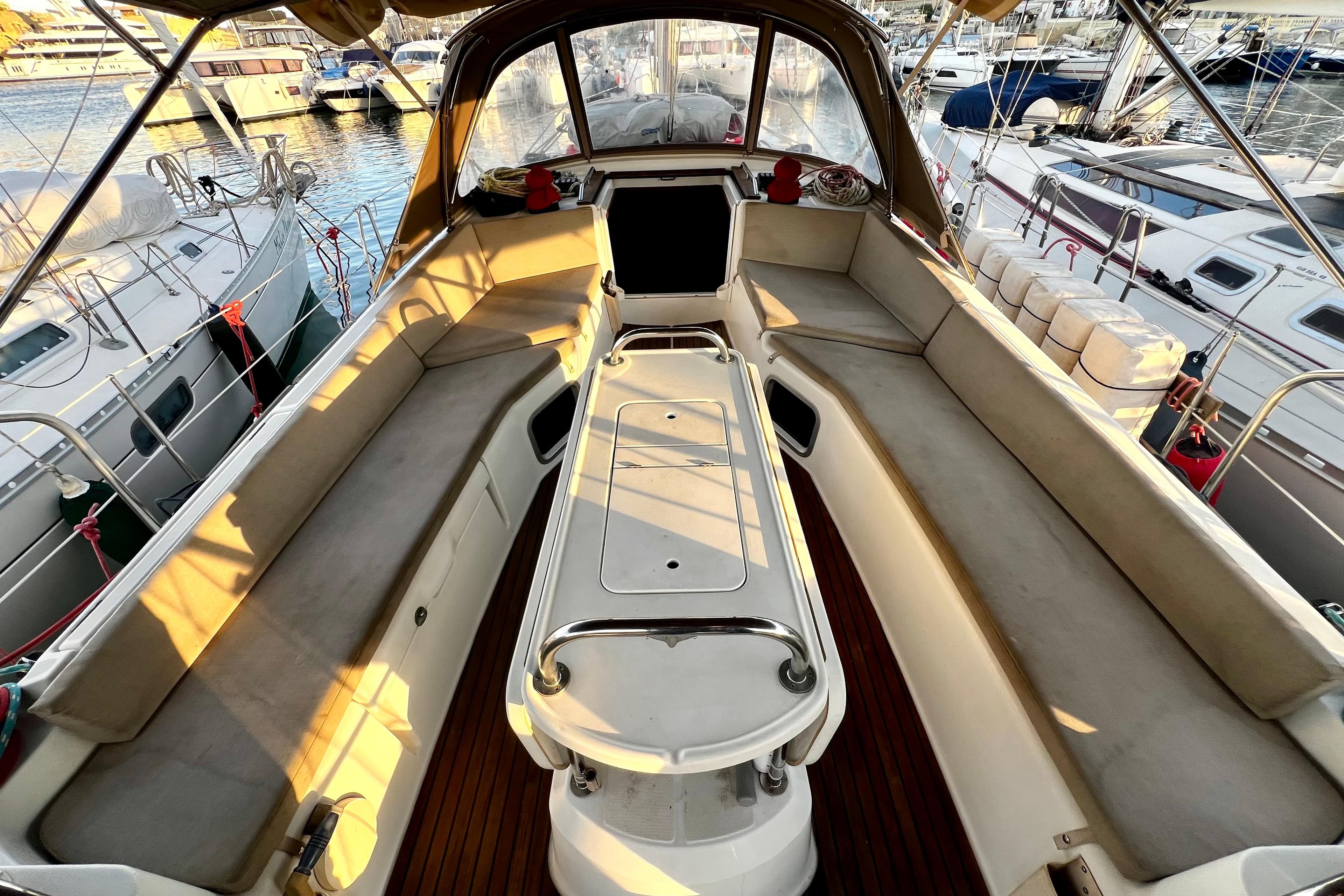 Cockpit of 2008 Jeanneau Sun Odyssey 45 DS sailboat, featuring spacious seating and elegant design.