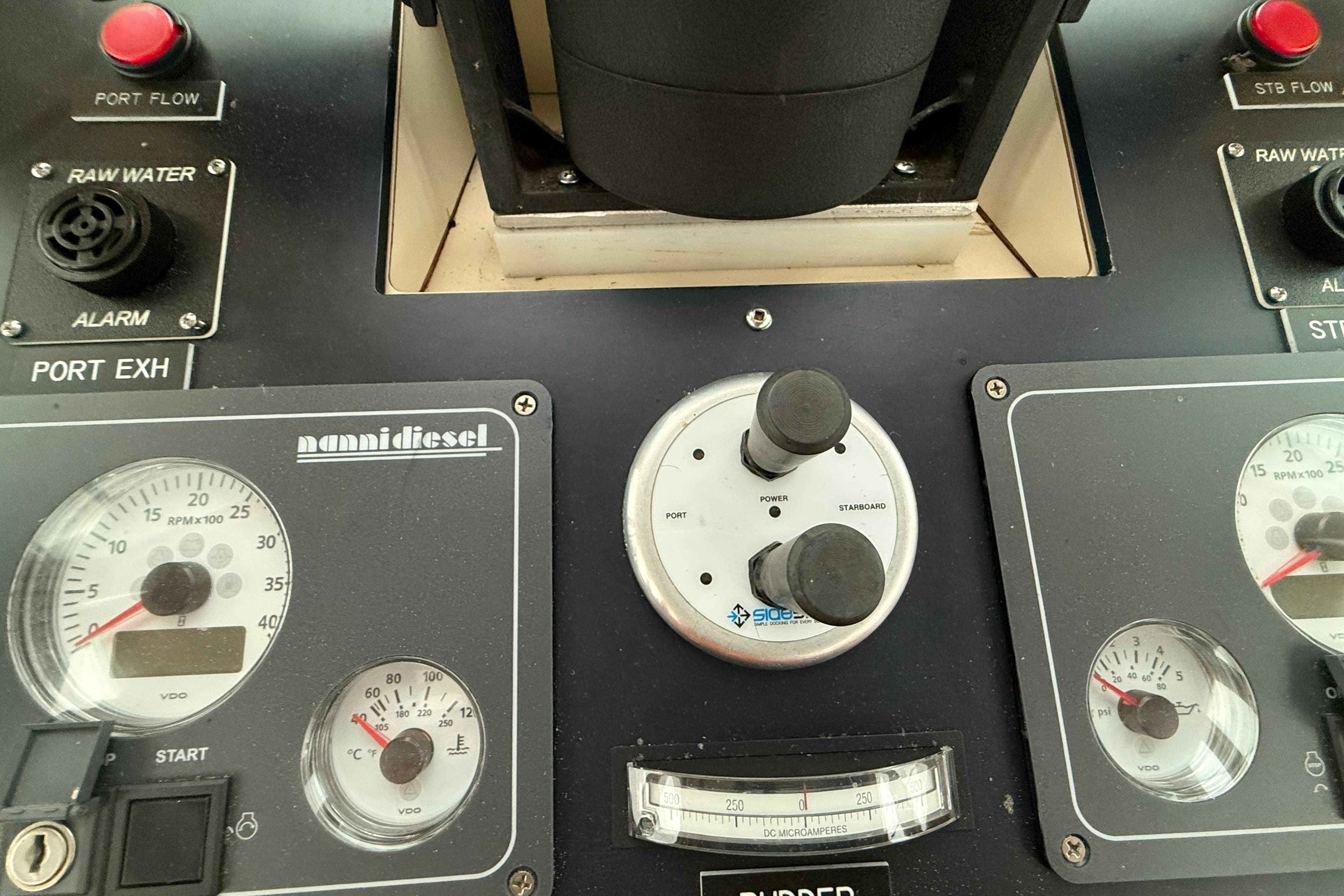 Control panel of a 1966 Vinette 430 Trawler with gauges and switches.