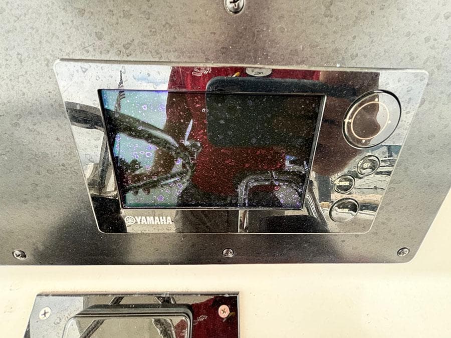 Yamaha display panel on a 2003 Marlago FS35 boat dashboard.