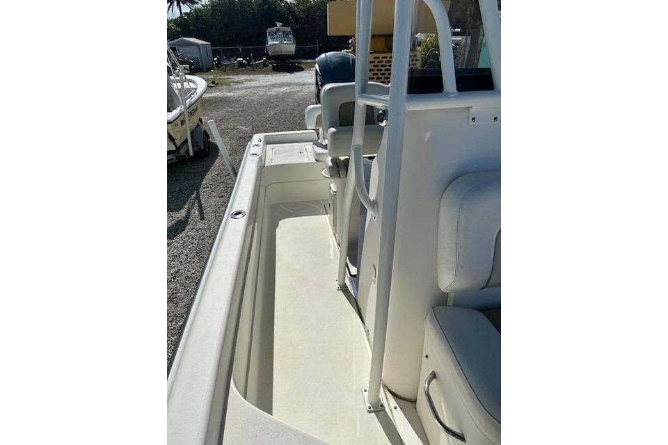 2014 ShearWater 25 LTD boat interior with seating and storage.