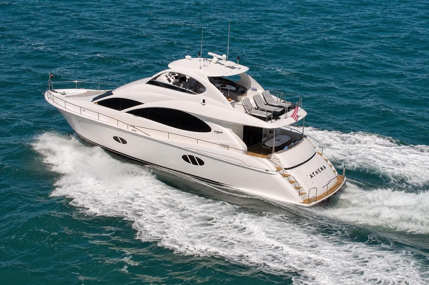 2006 Lazzara 68 Motoryacht cruising on open blue waters.