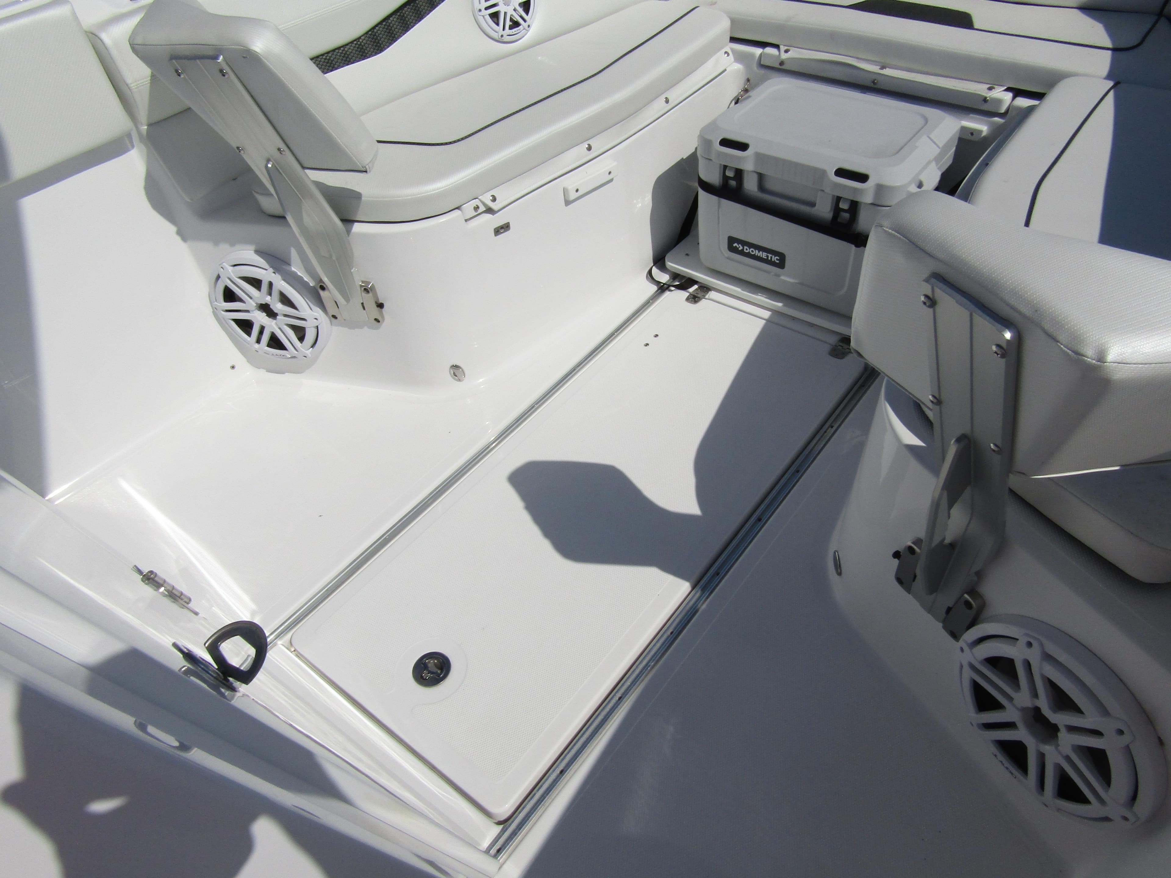 2024 Wellcraft 263 Fisherman boat interior with seating and storage compartments.