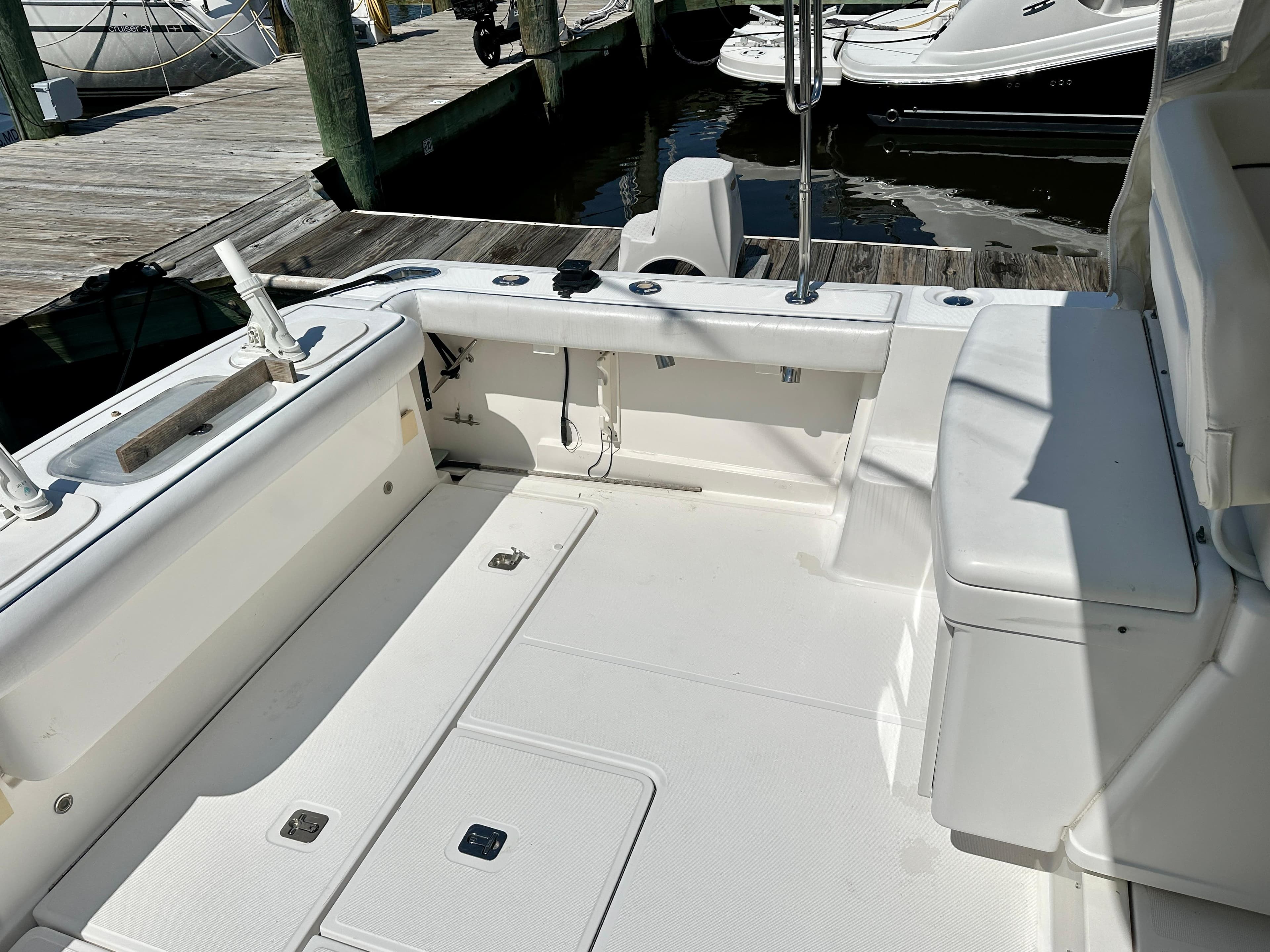 2005 Tiara Yachts 3600 Open cockpit with seating, docked at marina.