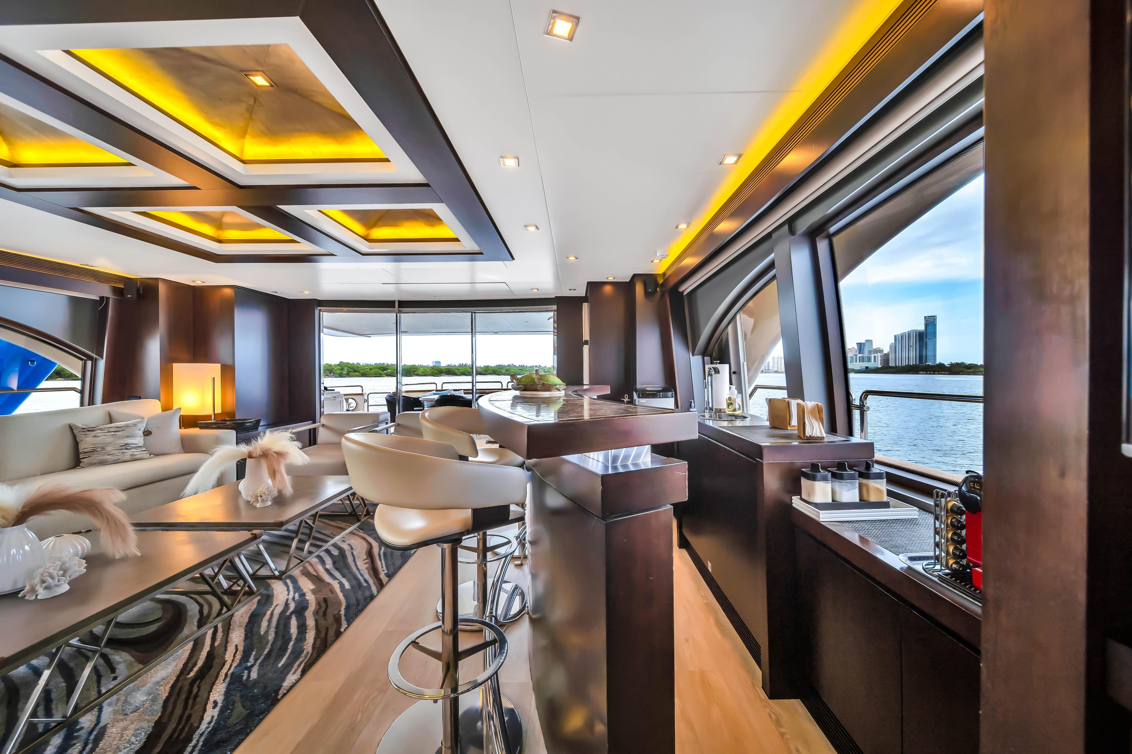 Luxurious 2012 Azimut yacht interior with modern design, elegant seating, and scenic water views.