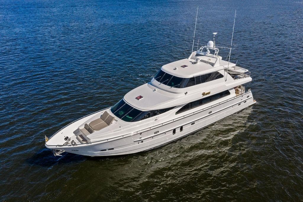 Luxurious 2005 Horizon 82 yacht cruising on open water.