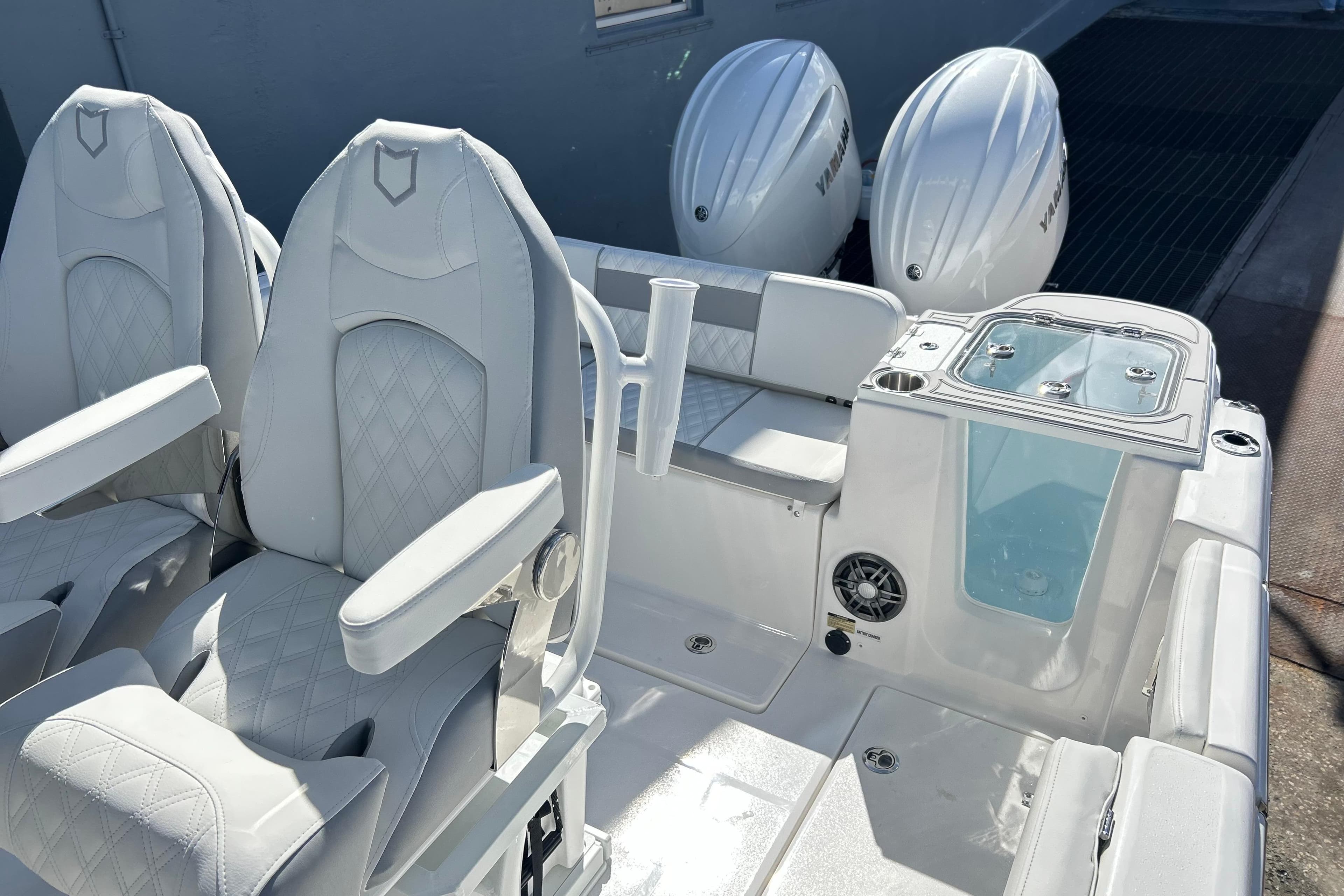 2026 Sea Fox 268 Commander boat interior with dual seats and twin Yamaha engines.
