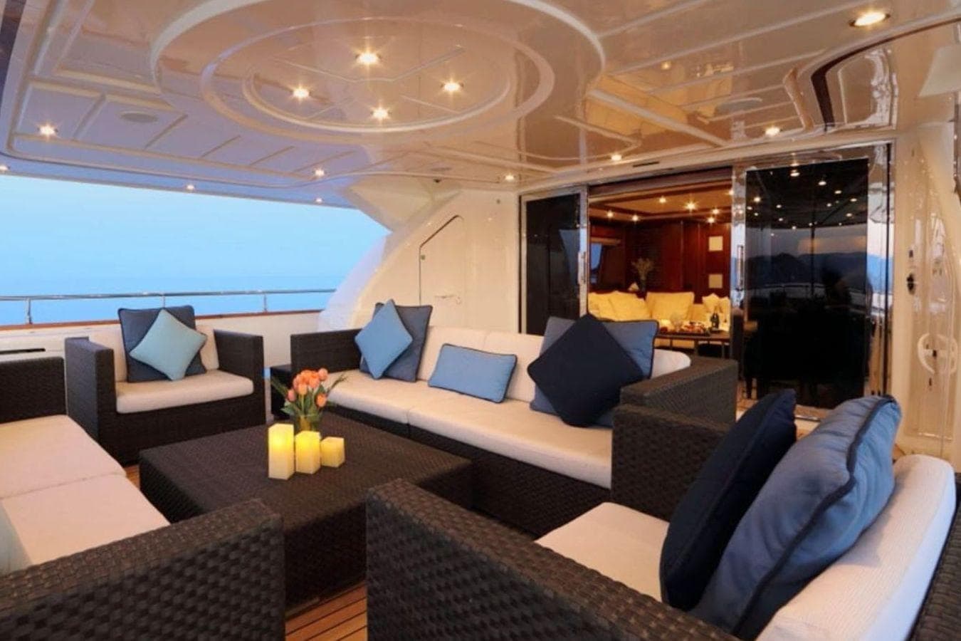 Luxurious CRN 128 yacht deck with elegant seating, cushions, and ambient lighting, 2007 model.
