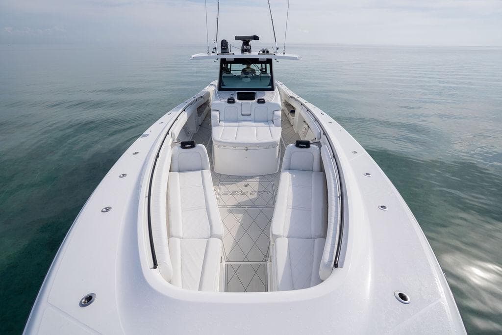 2019 HCB 53 boat with spacious seating on calm water.