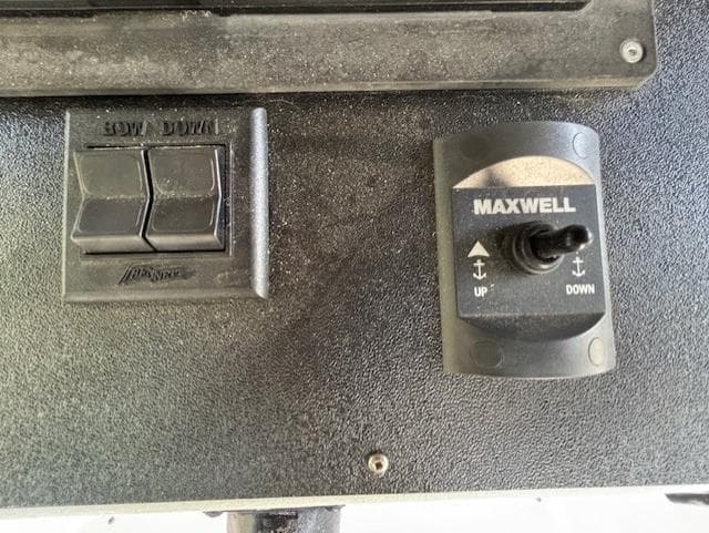 Control panel with Maxwell switch and buttons on a 1988 Riviera Convertible.