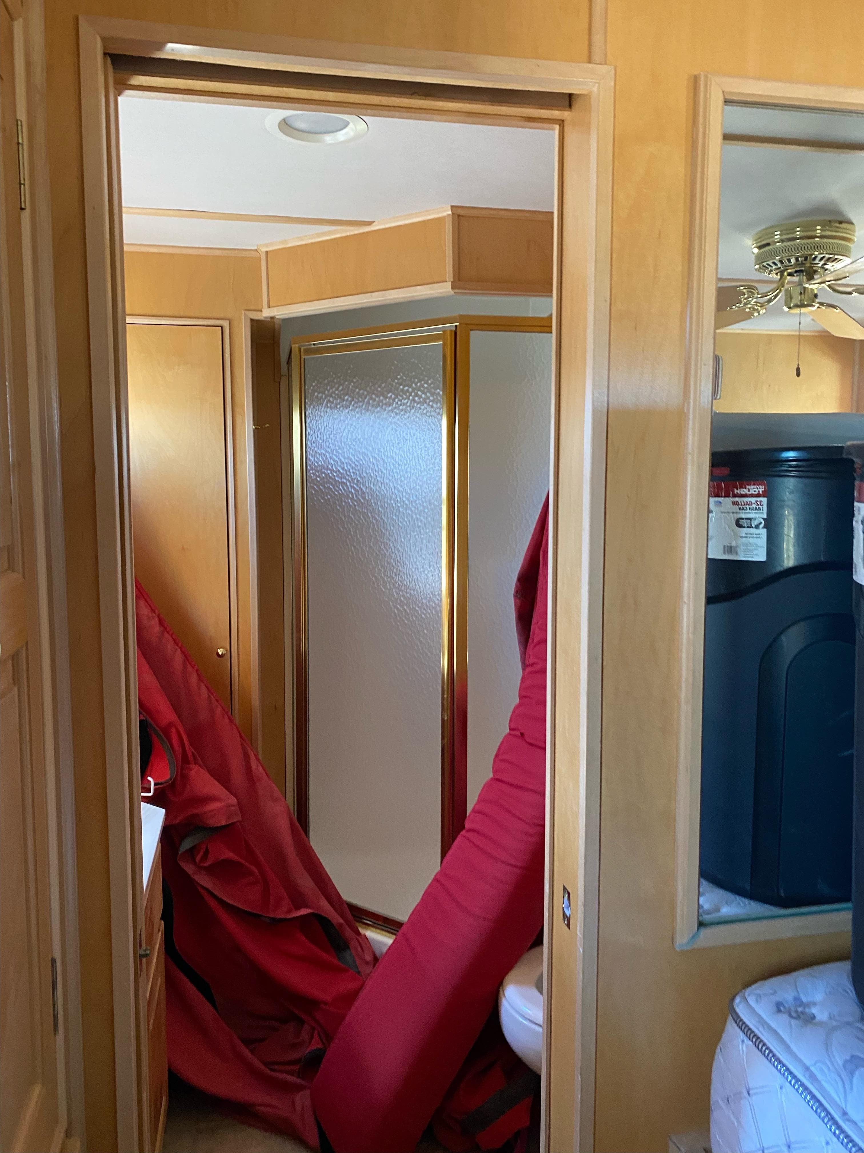Interior of 2003 Stardust Cruisers Red Rock Retreat Week 26 houseboat bathroom.