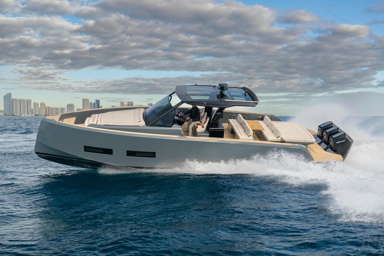 2026 Pardo Yachts P43R cruising on open water under a partly cloudy sky.