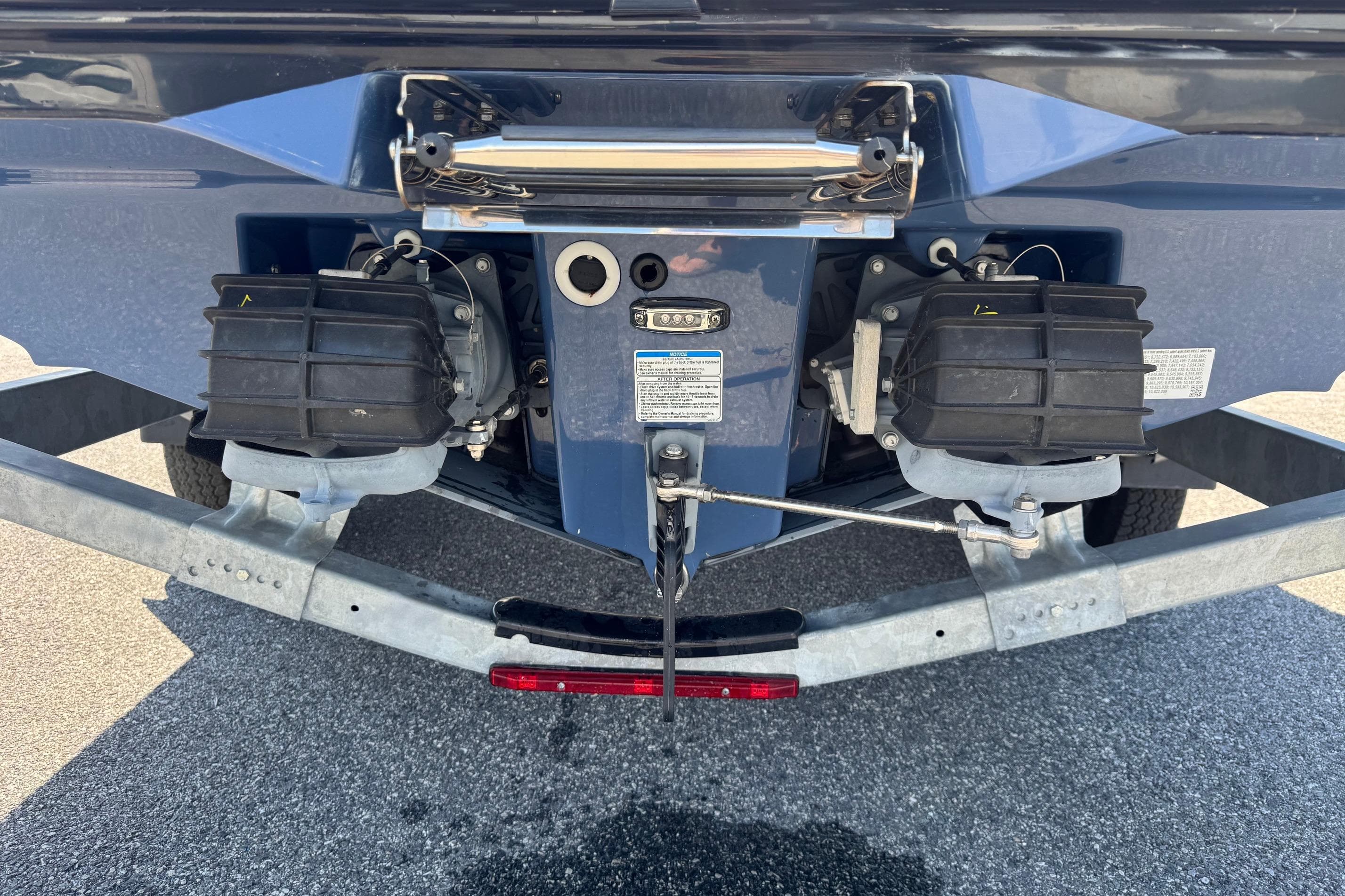 Rear view of 2023 Yamaha Boats 222SD showing dual jet propulsion system.