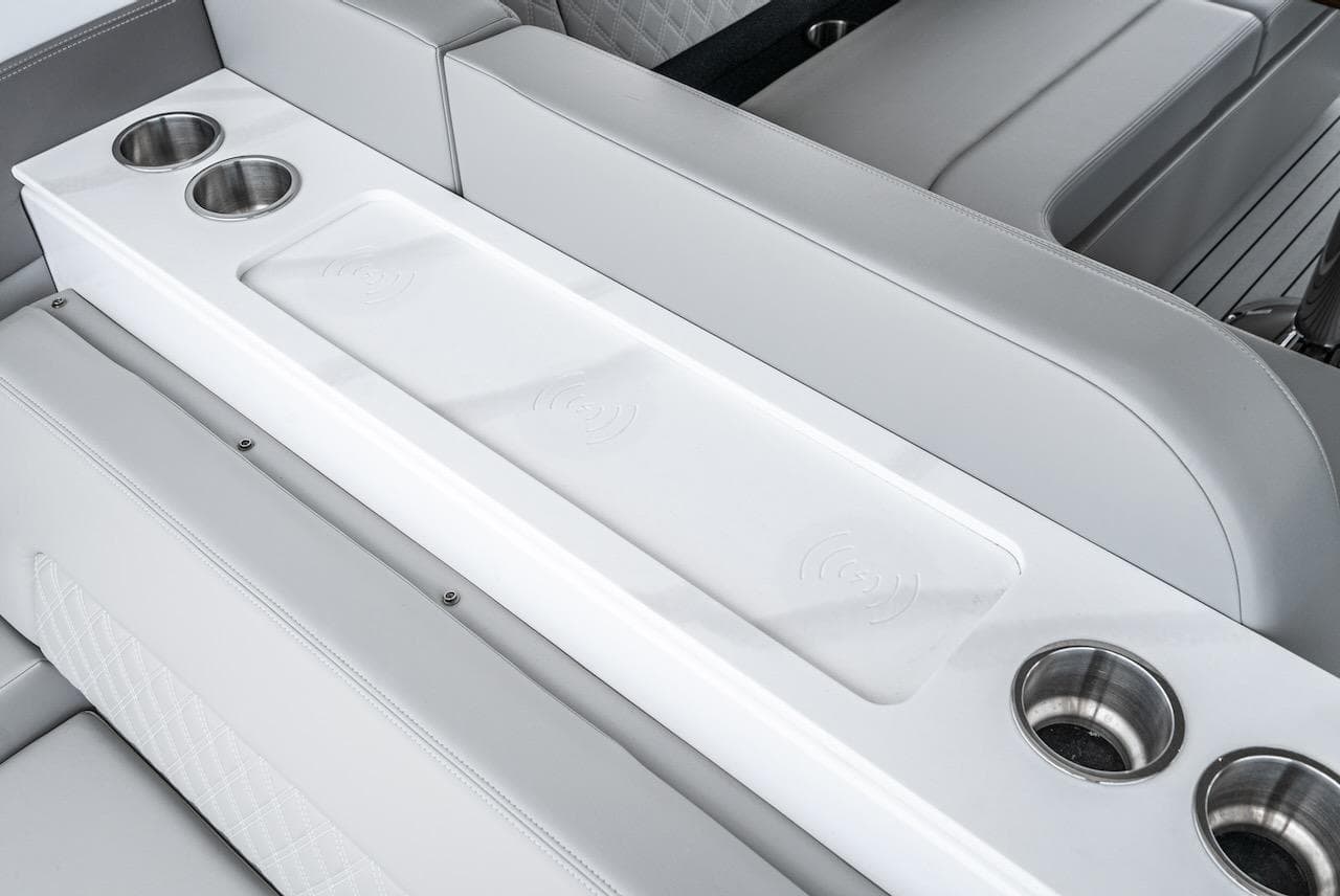 Luxury seating with cup holders on the 2024 Cruisers Yachts 50 GLS.