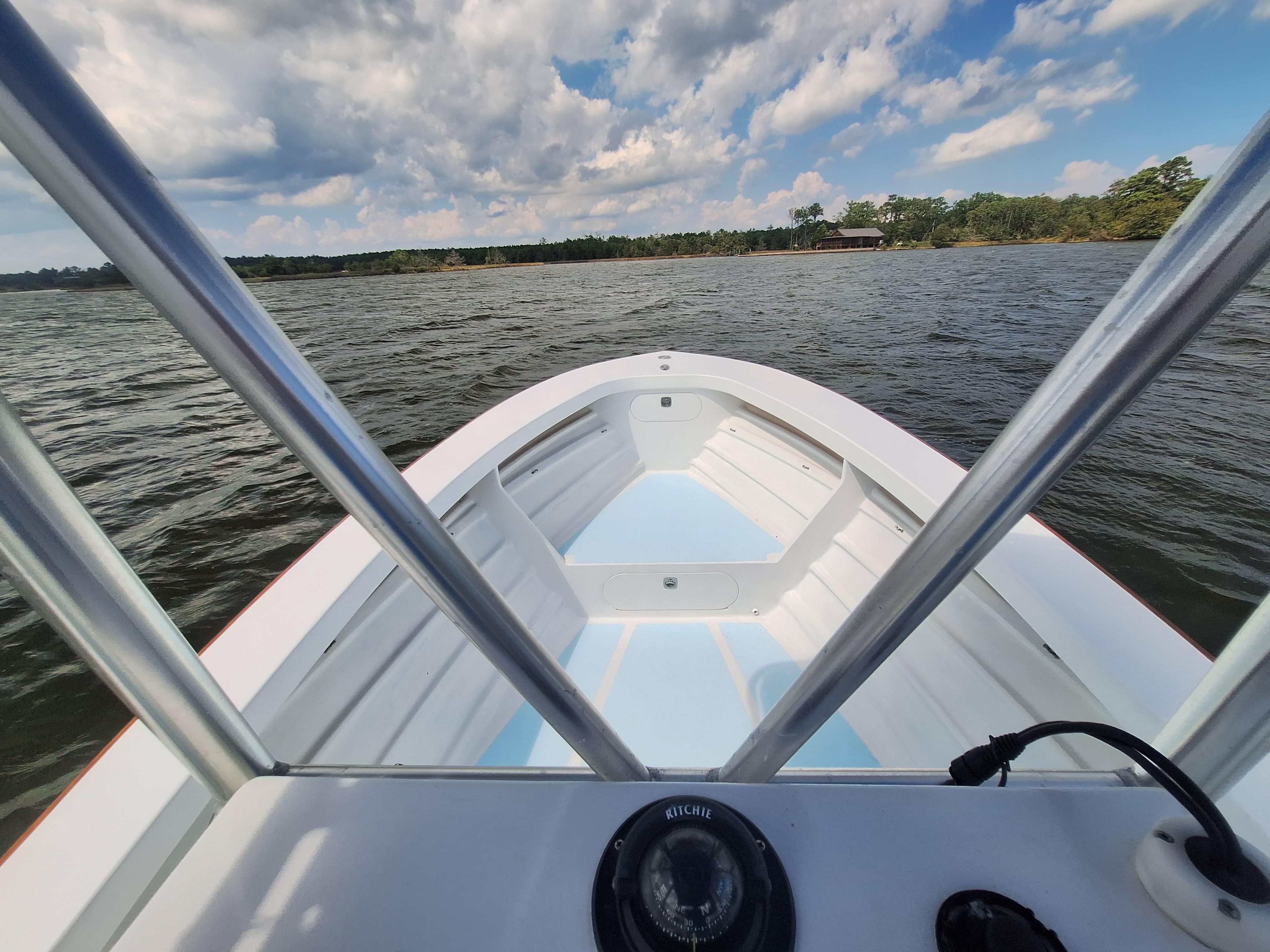 View from a 2008 Custom Carolina boat on the water.