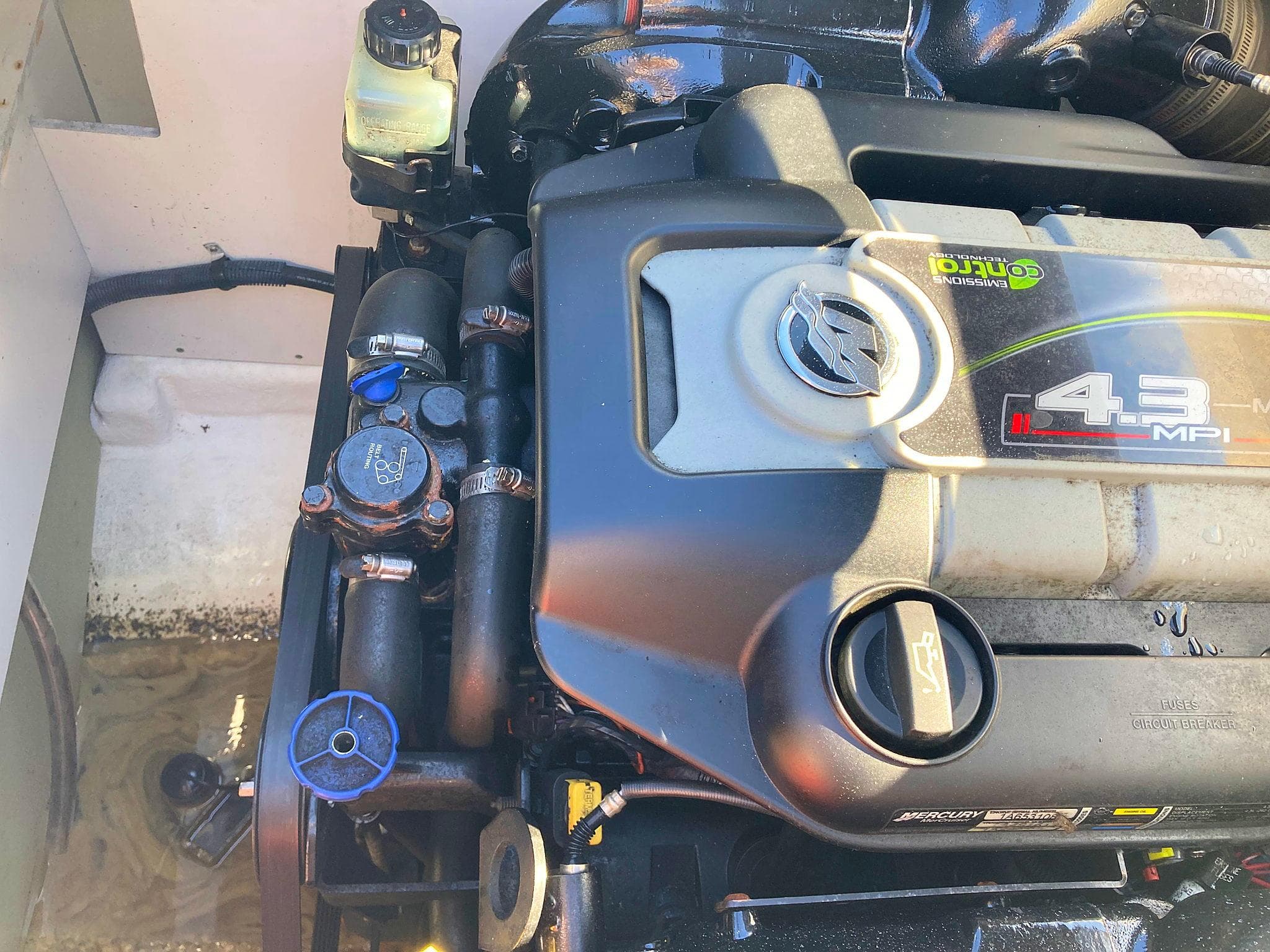 Engine of a 2012 Sea Ray 190 Sport boat, featuring a 4.3L MPI motor.