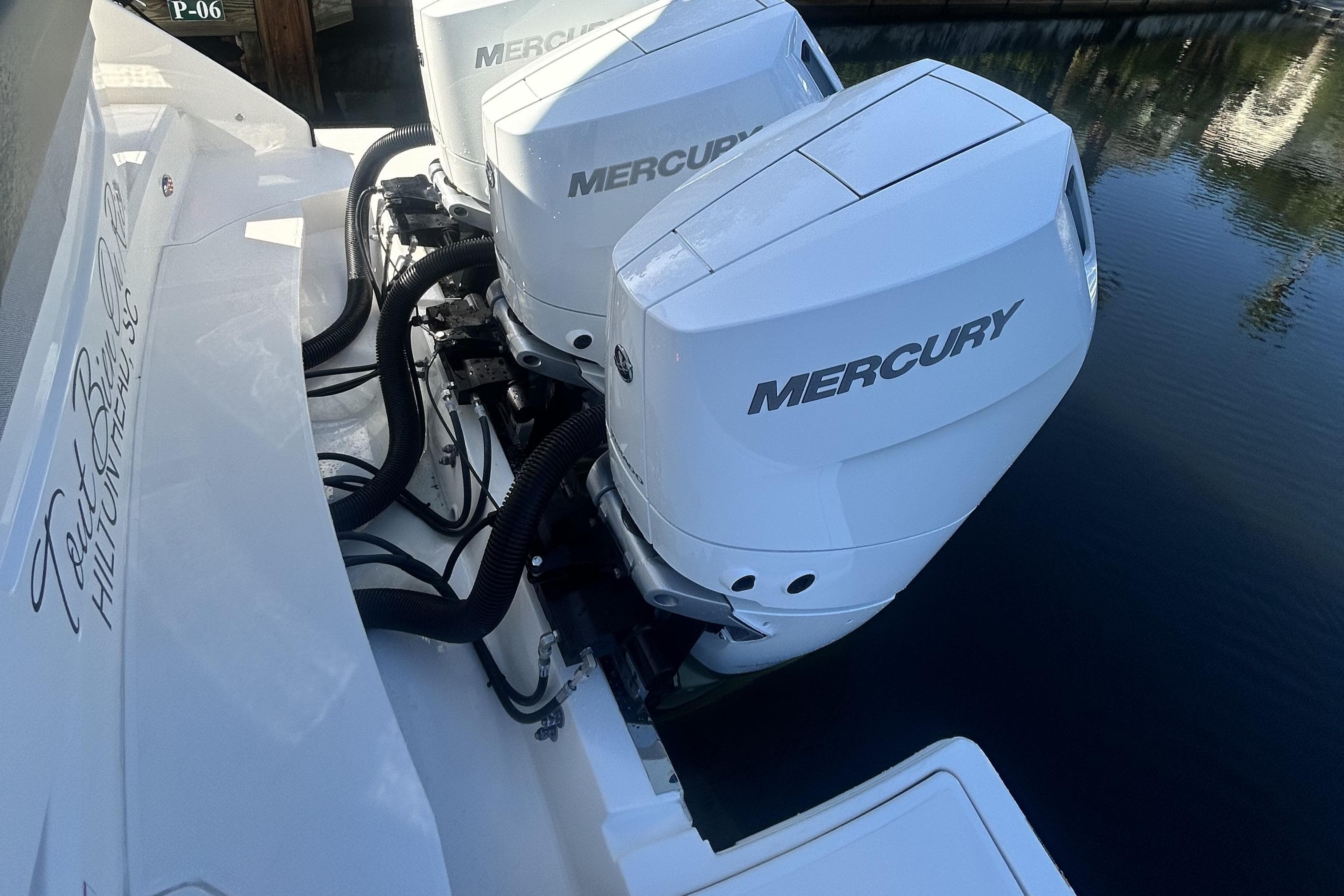2023 Tiara Yachts 38 LS with dual Mercury outboard engines on water.