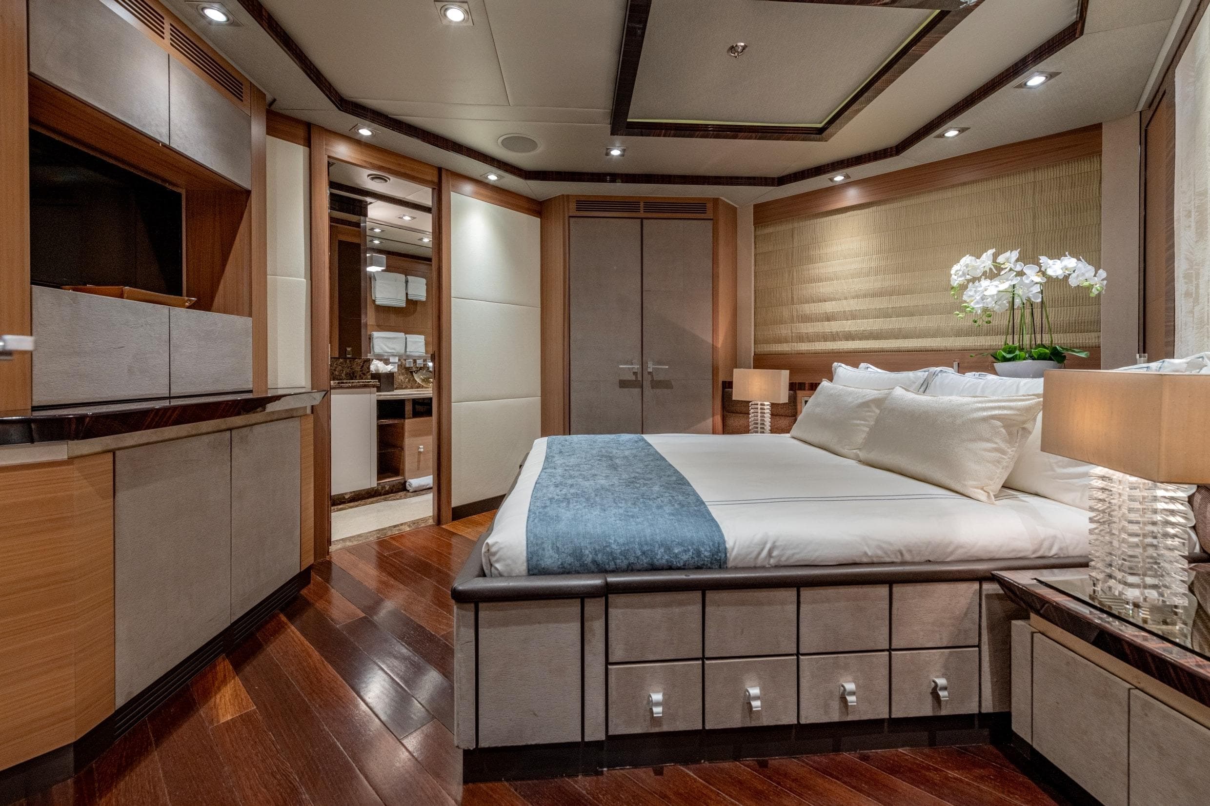 Luxurious 2008 Palmer Marine PJ150 yacht bedroom with elegant decor and modern amenities.