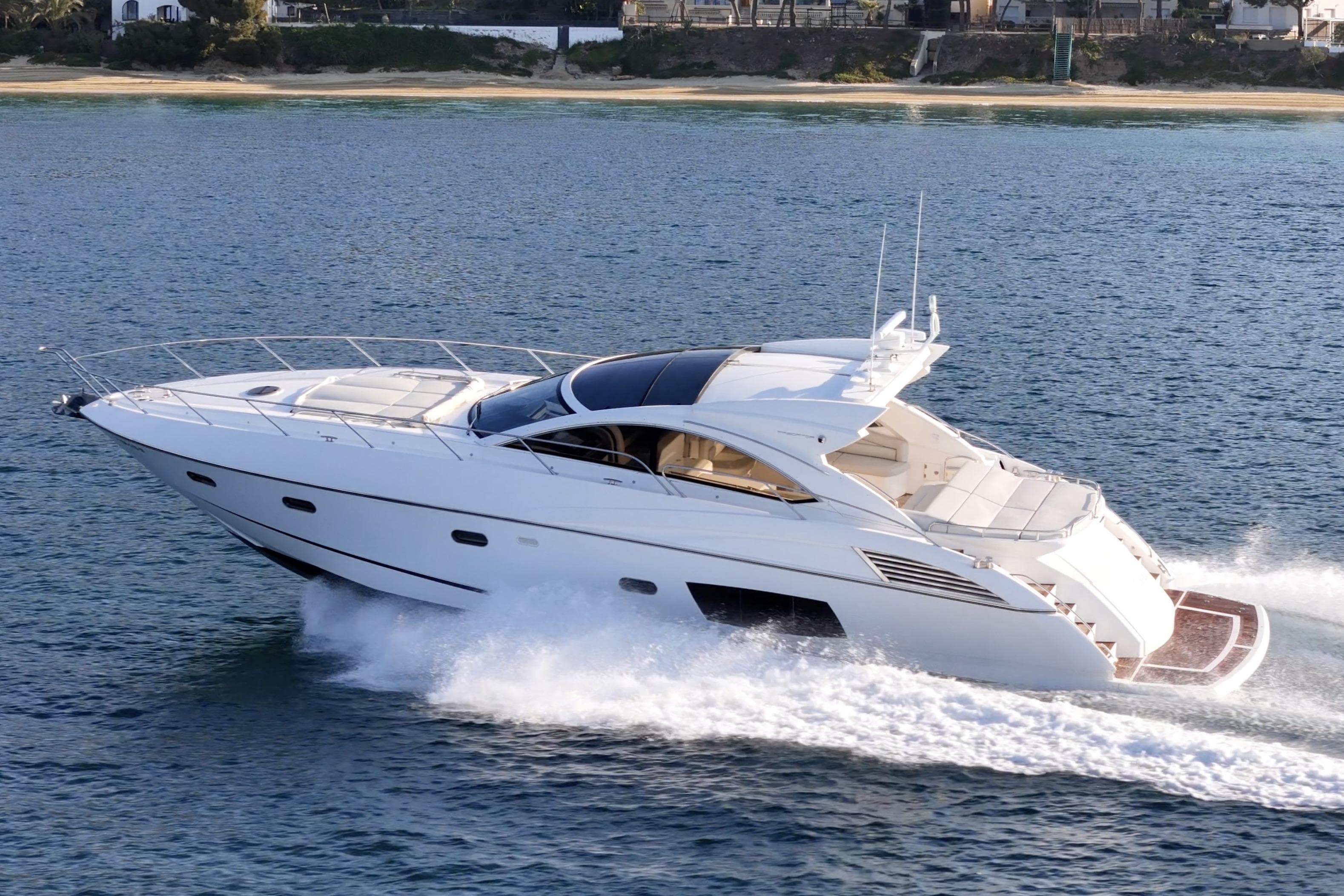2012 Sunseeker Predator 60 yacht cruising on open water.