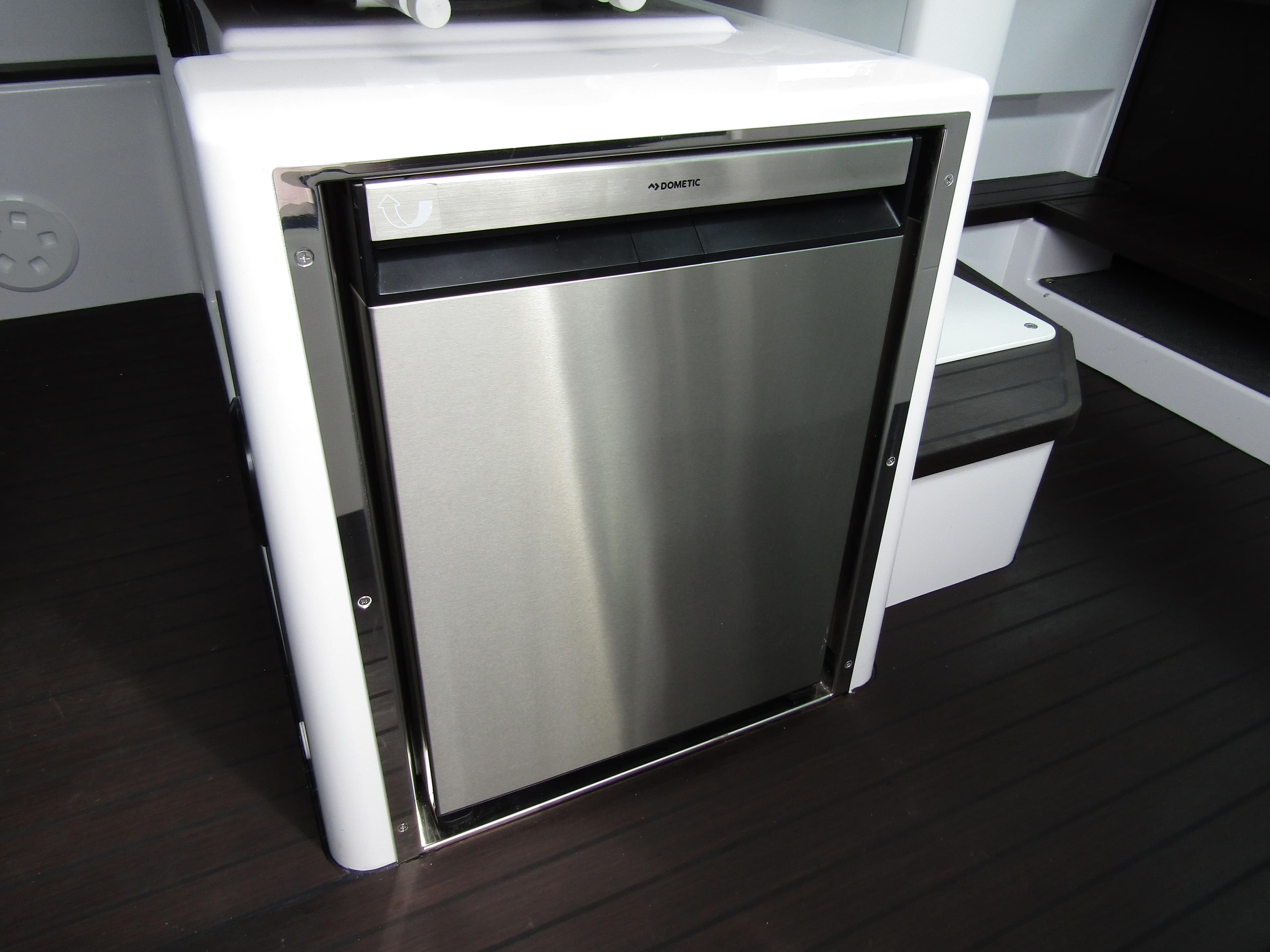 Stainless steel fridge in 2024 Axopar 37XC CROSS CABIN boat interior.