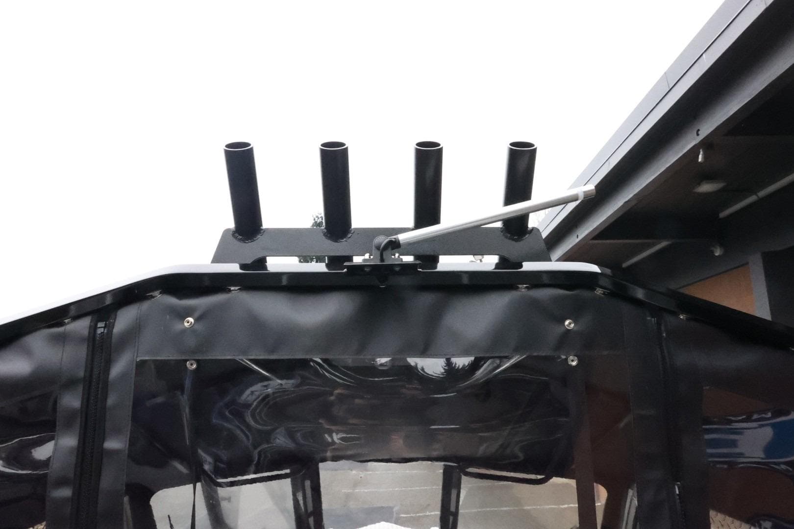 2026 Thunder Jet 210 Luxor Limited boat with rod holders and canopy detail.