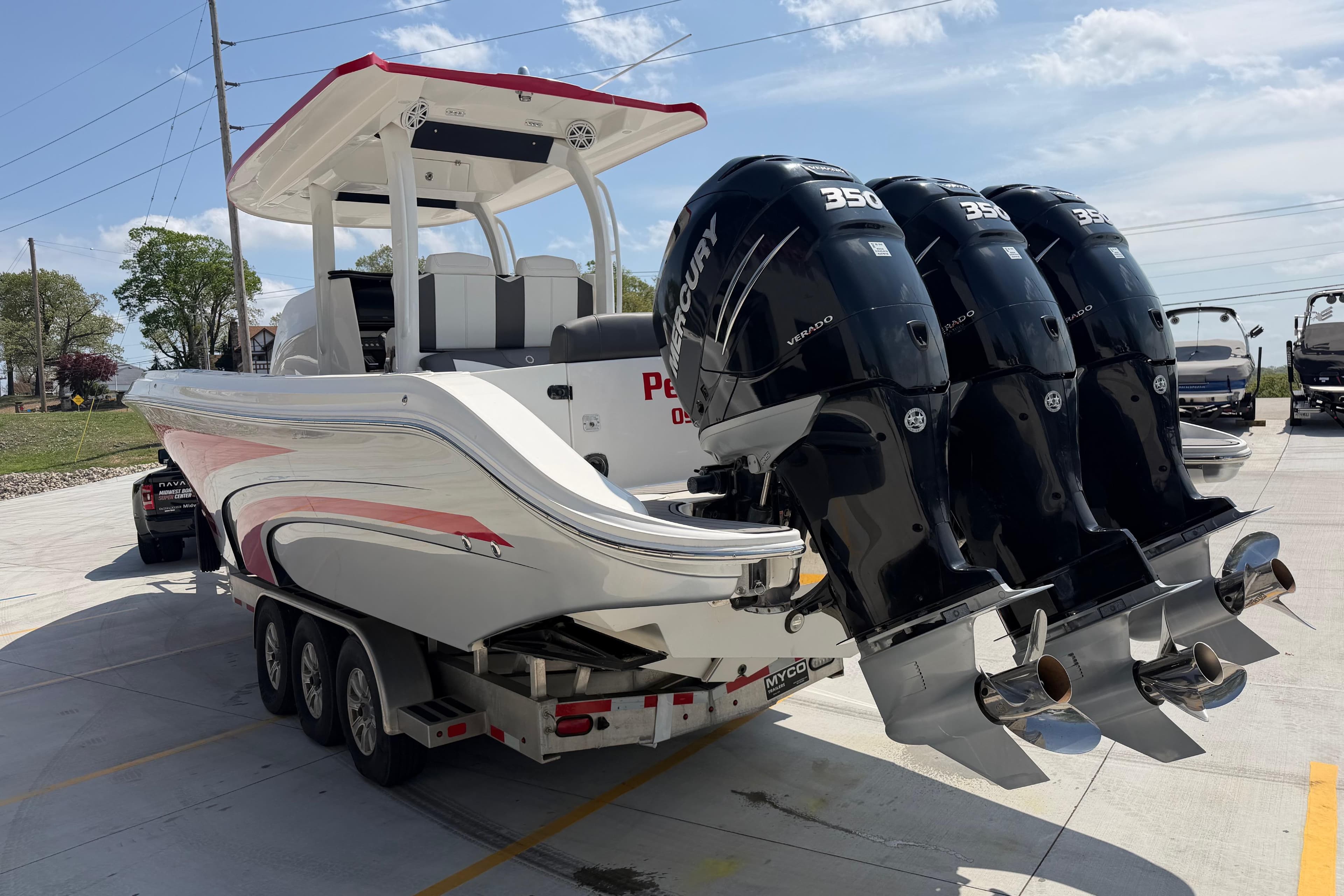 2018 Fountain 39 NX boat with triple Mercury 350 engines on a trailer.