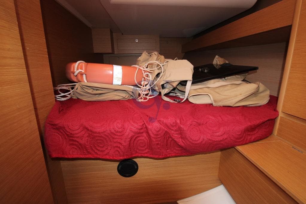 Interior cabin of 2017 Dufour 382 Grand Large with life preserver and gear.