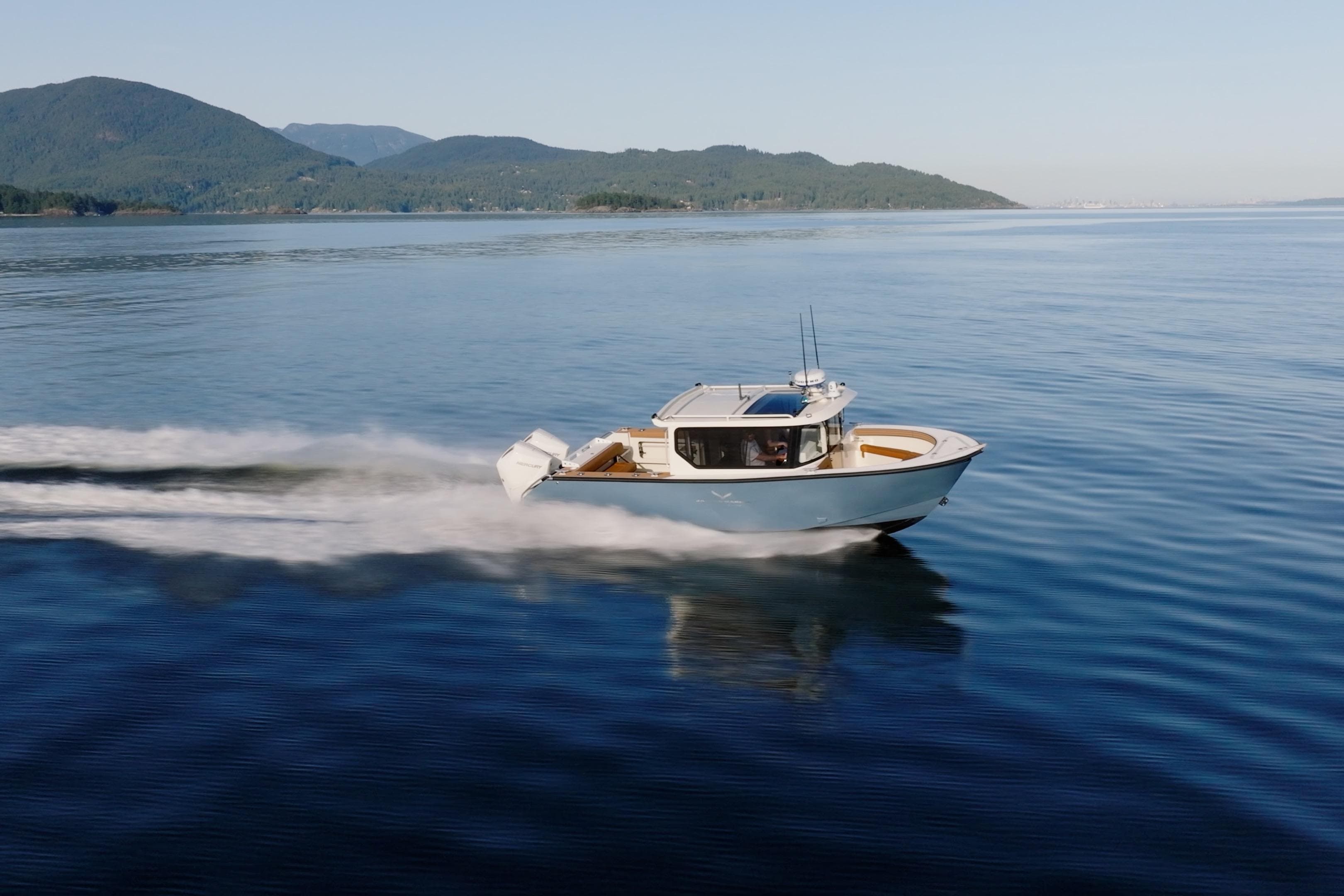 2026 Jasper Marine Defender 22 Open Bow cruising on serene waters.