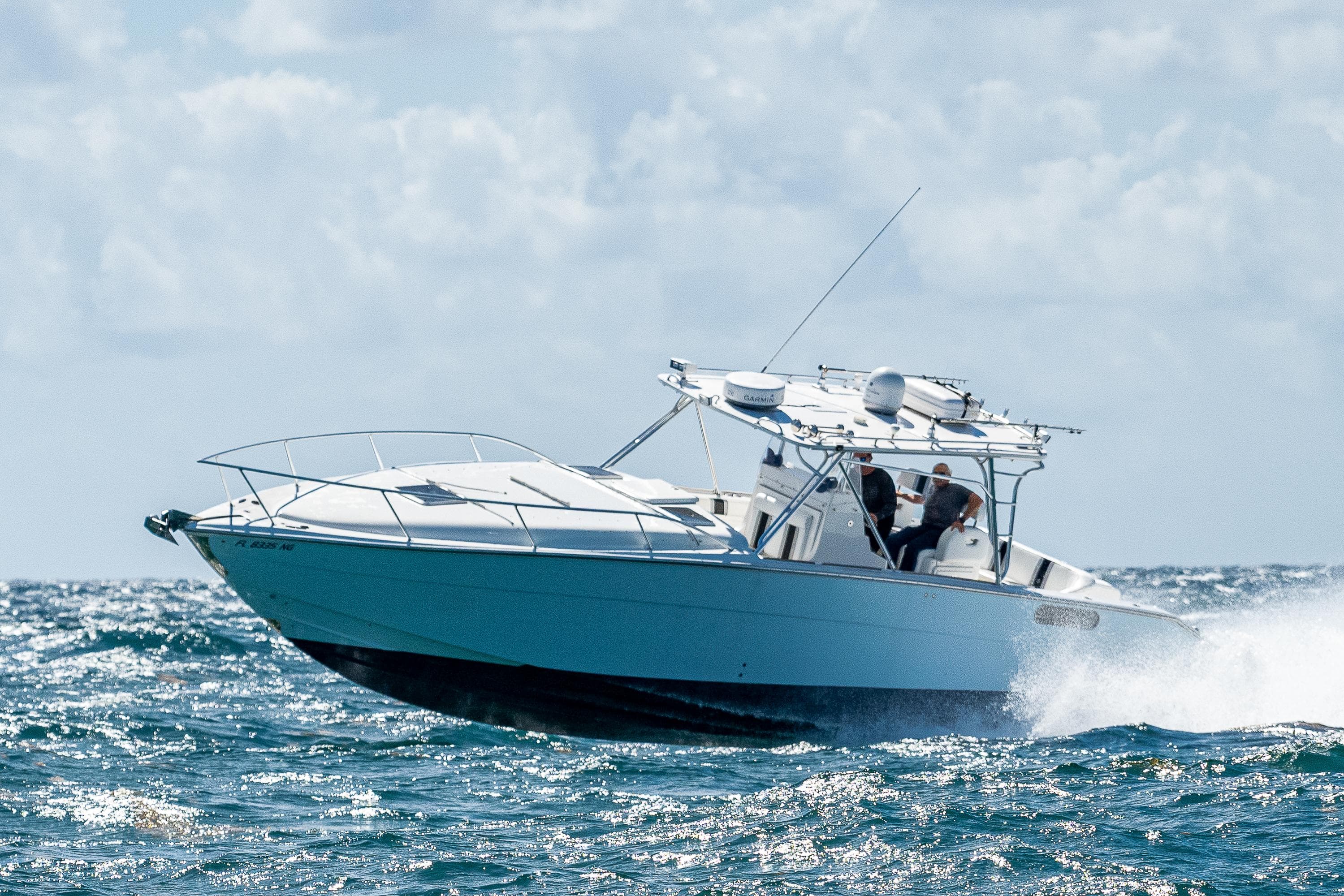 2007 Marlin Yachts 42 cruising on open water.