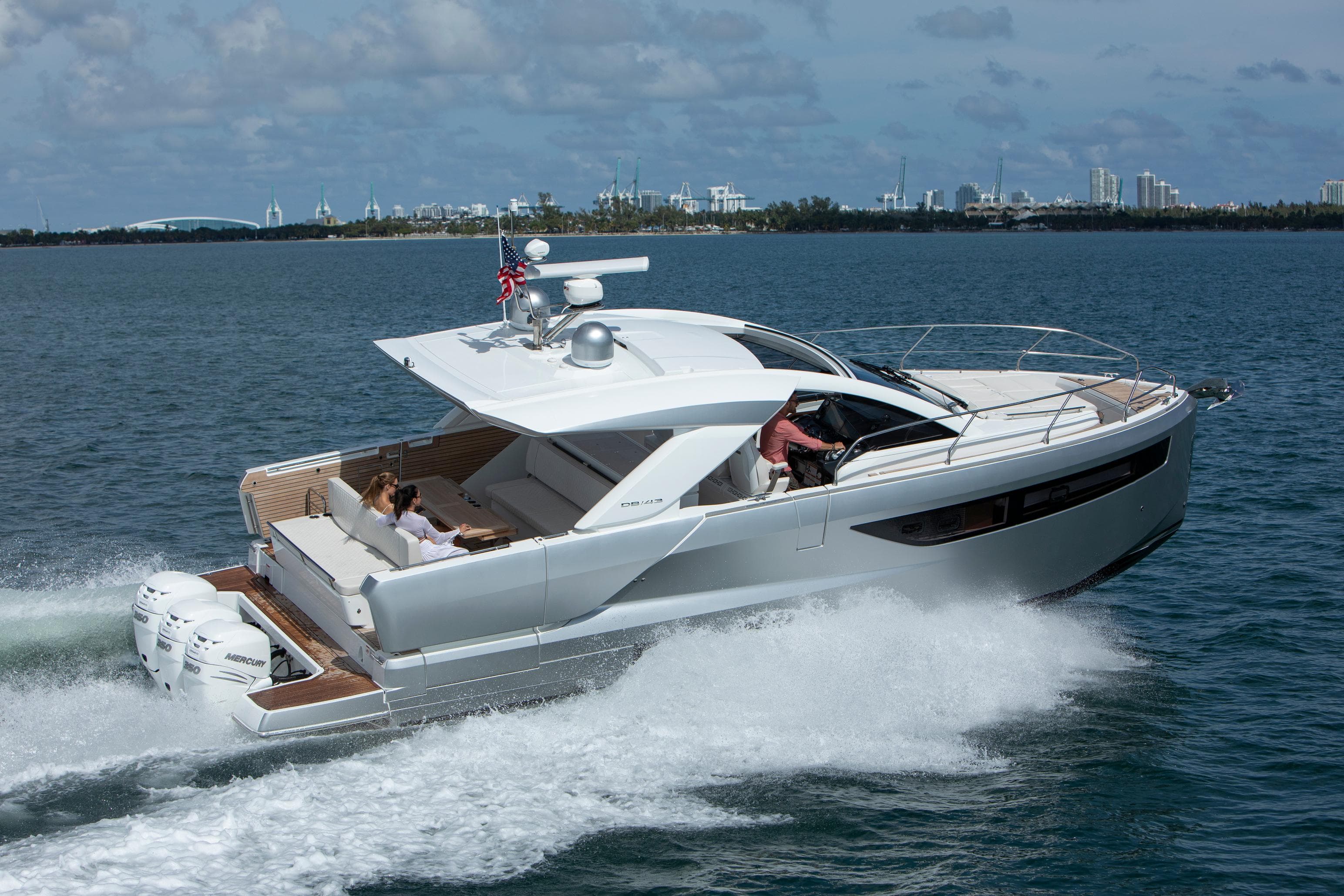 2025 Jeanneau DB 43 yacht cruising on open water, showcasing sleek design and powerful engines.