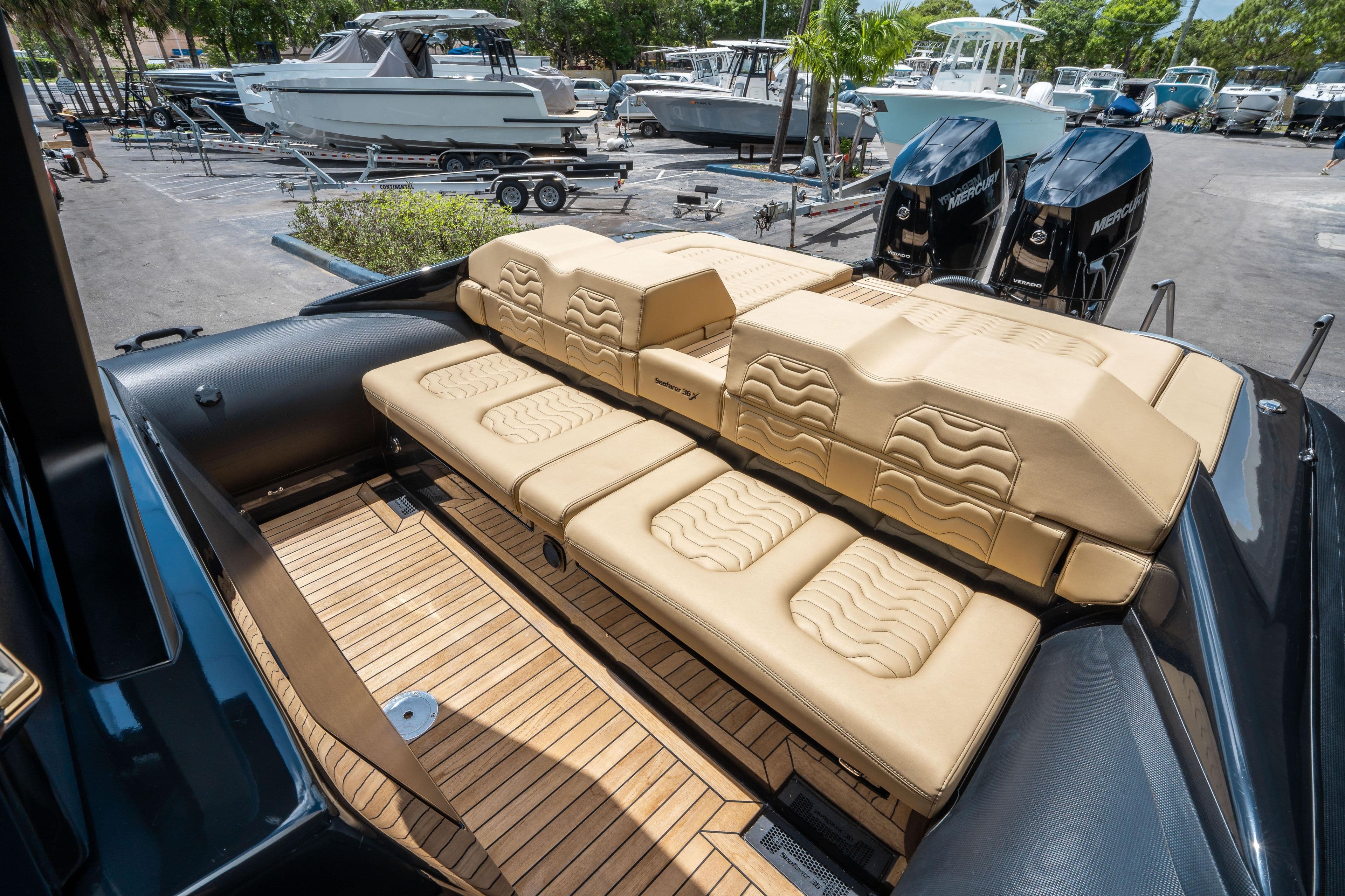 2023 Ribco Seafarer 36 X luxury boat with beige seating and twin engines.