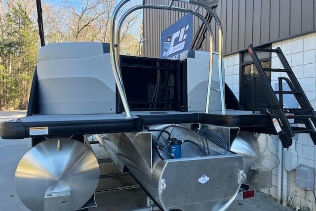 2026 Godfrey Sweetwater 2086 SB pontoon boat, rear view, parked outdoors.