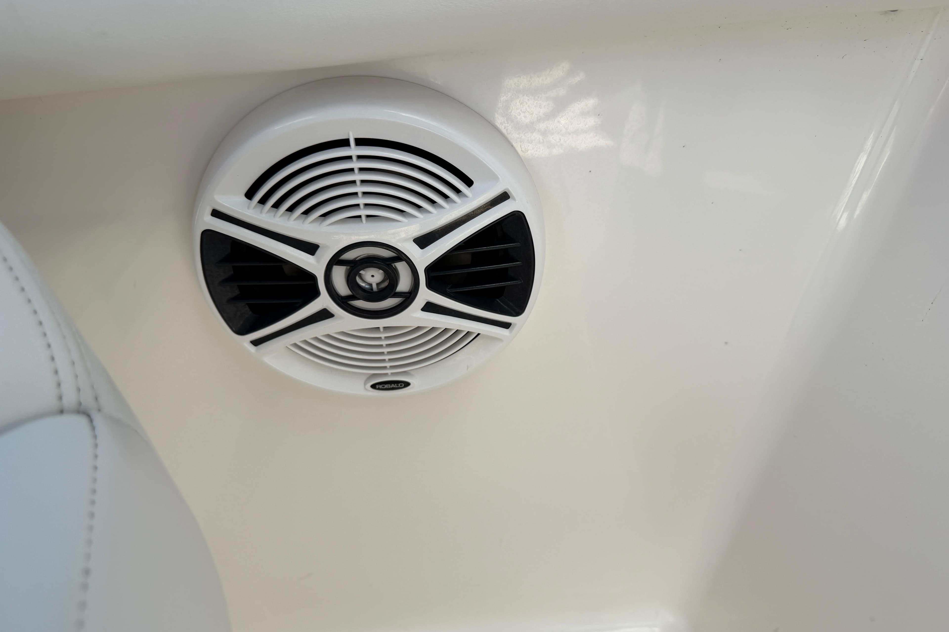 Speaker on a 2015 Robalo R227 Dual Console boat interior.