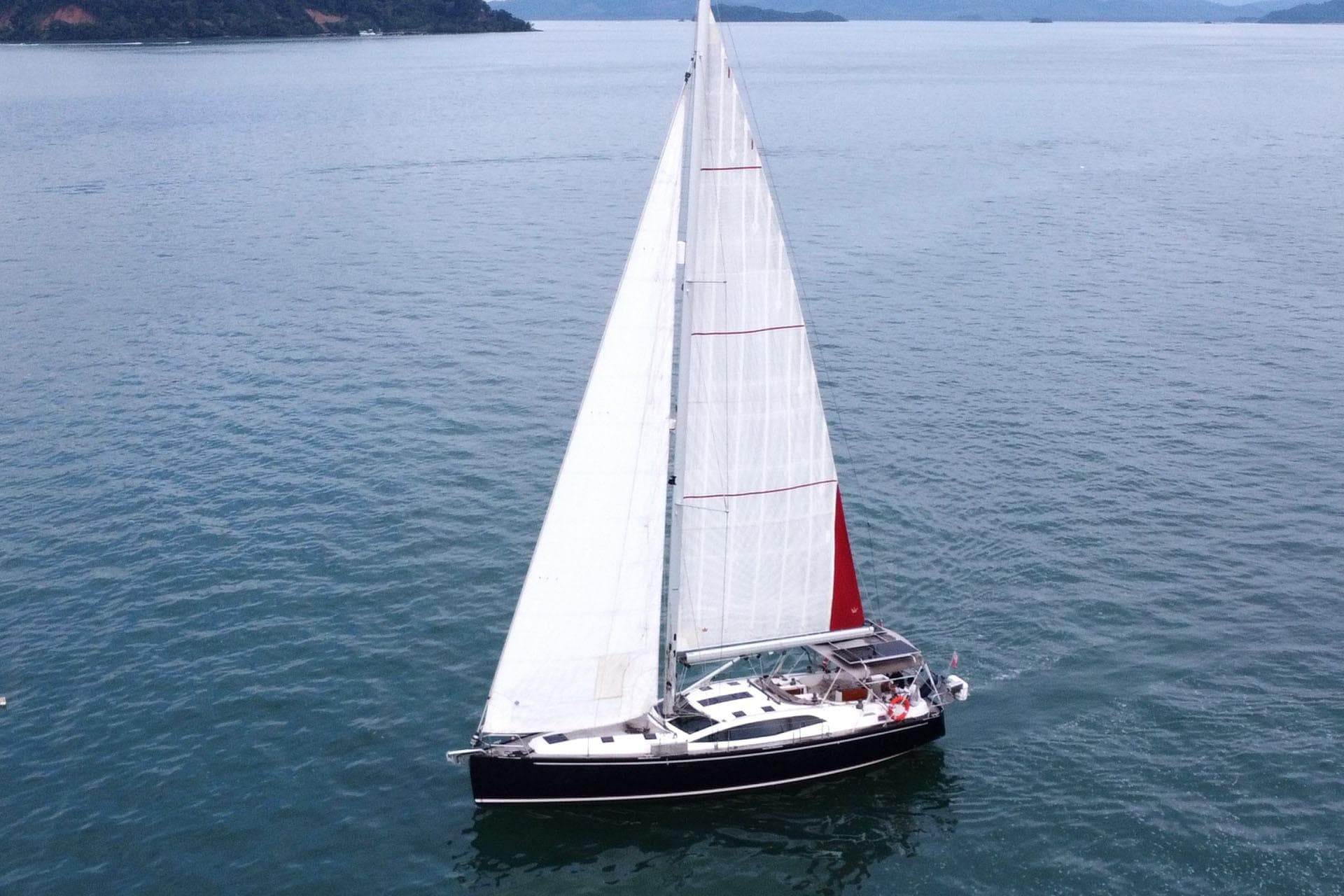 Sailing yacht Southerly 47, 2014 model, cruising on open water.