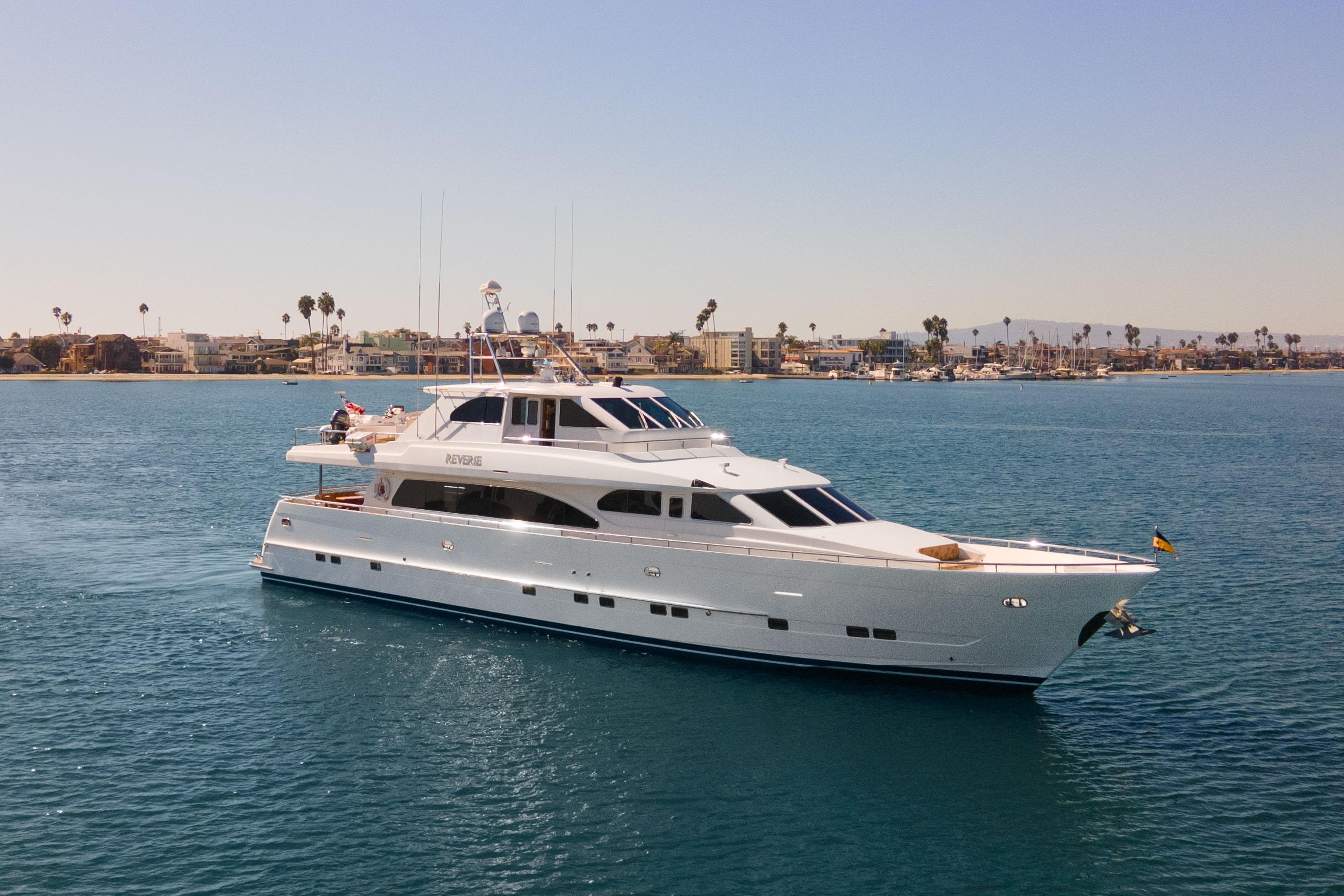 Luxury yacht cruising near coastal city, 2005 C Custom model.