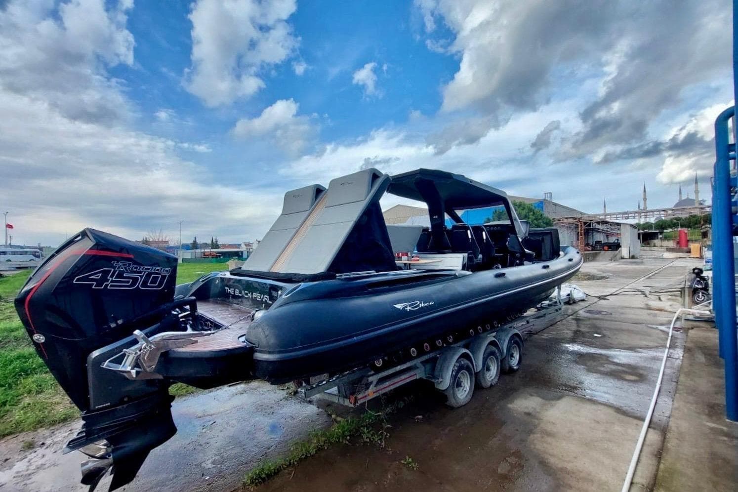2021 Ribco Venom 44 boat on trailer, featuring powerful outboard engine.
