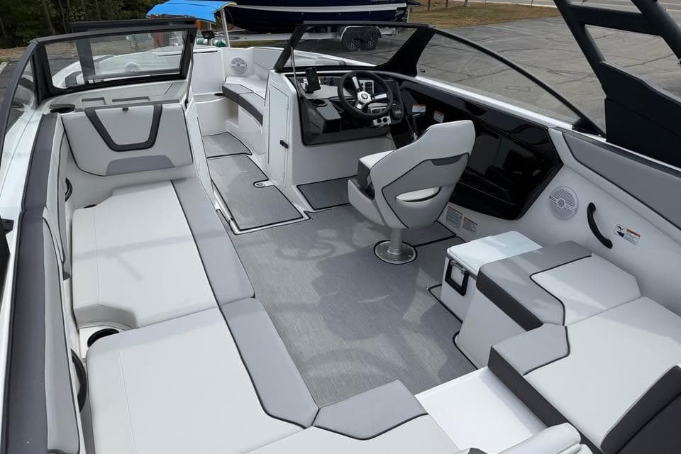 2026 Yamaha Boats AR220 interior with modern seating and sleek design.