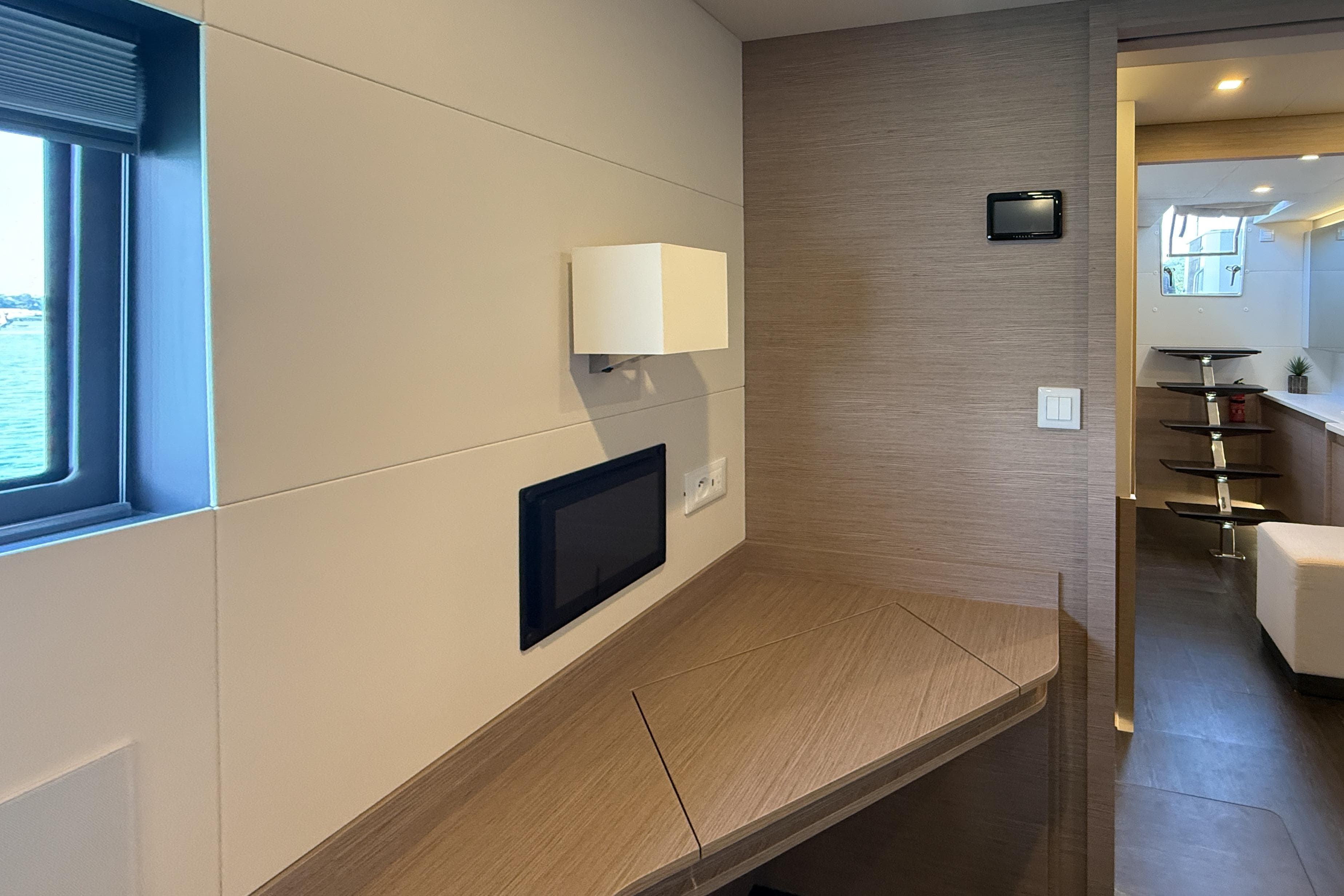 Modern interior of 2021 Fountaine Pajot Samana 59 yacht with sleek design and natural lighting.