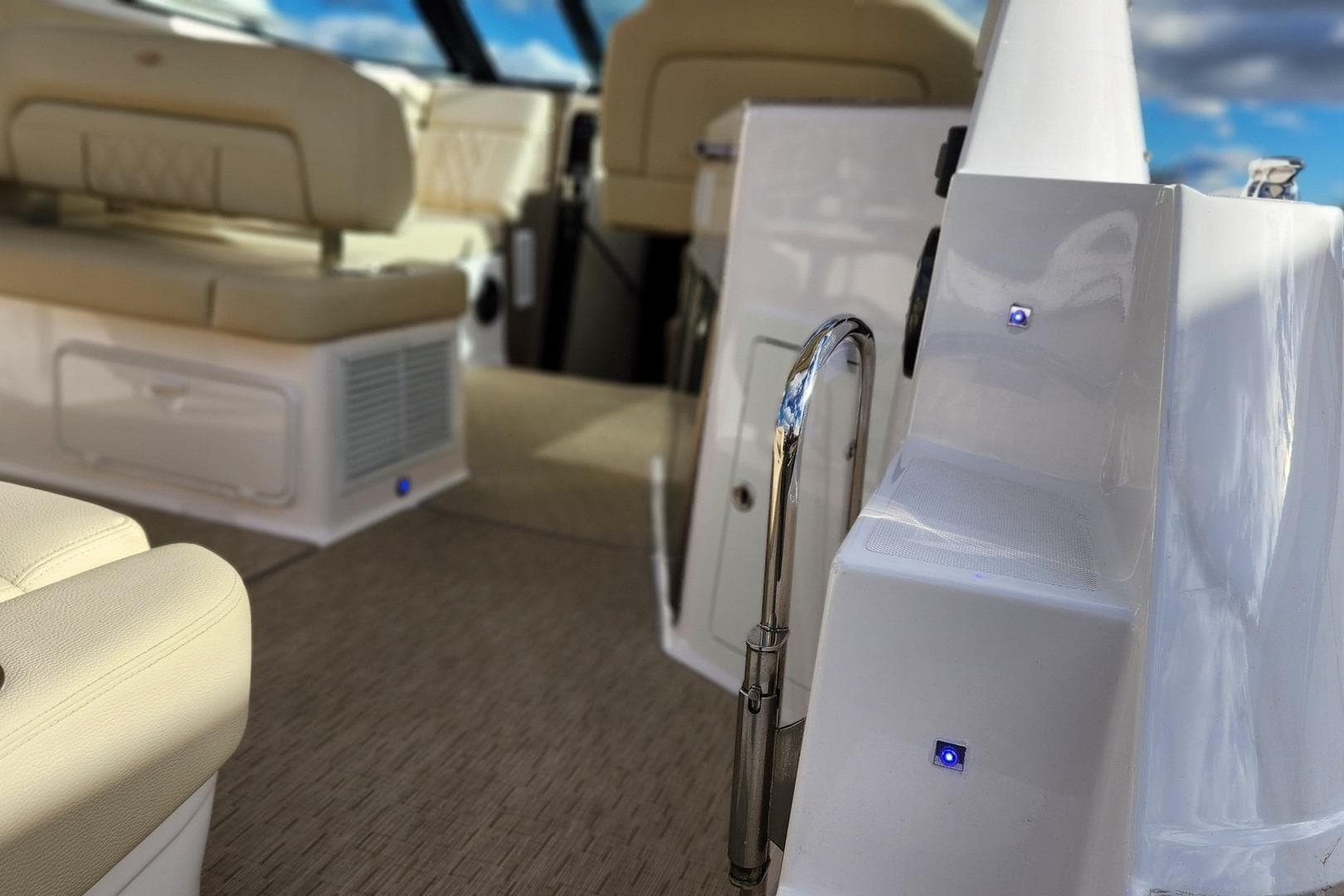 Luxurious interior of 2018 Regal 35 Sport Coupe with beige seating and modern design.