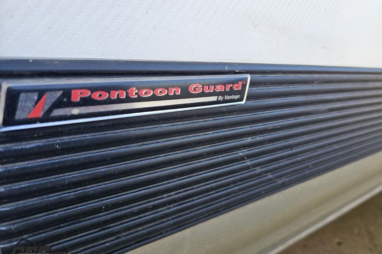Close-up of Pontoon Guard label on 2019 JC Tritoon Neptoon 25 Sport SL.