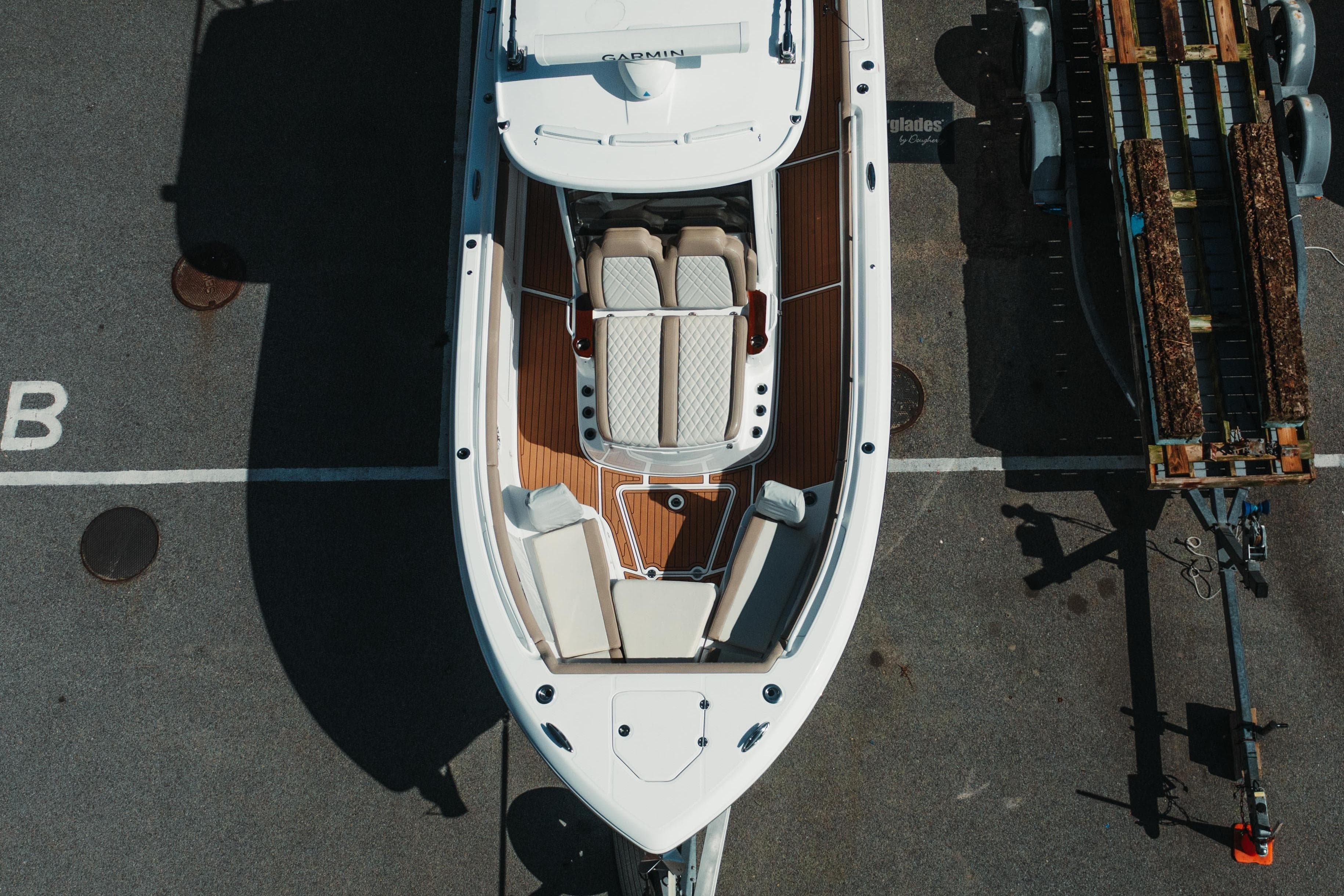 Overhead view of 2024 Everglades 315 Center Console boat on trailer.