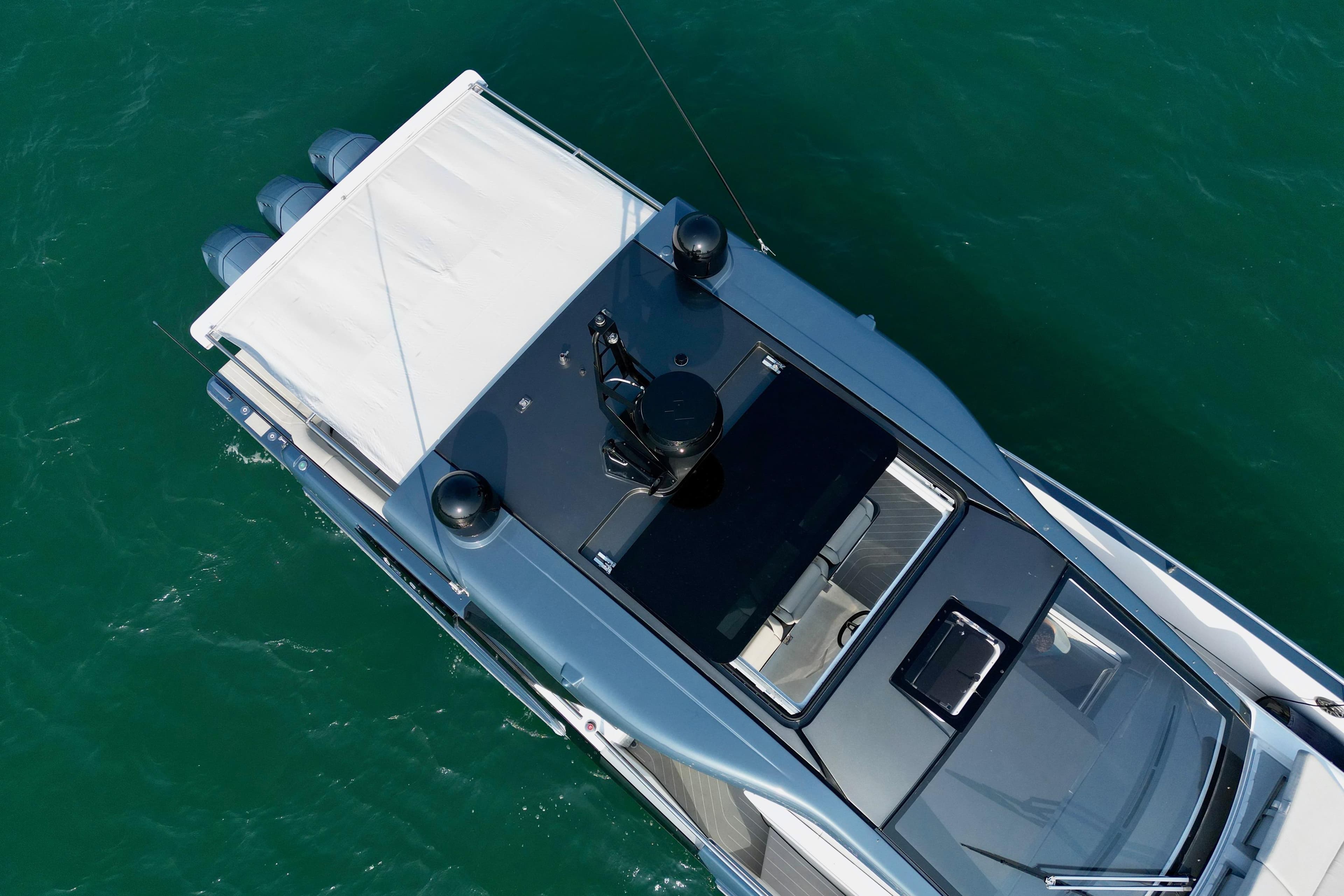 Aerial view of 2024 Azimut Verve 48 yacht on turquoise water.