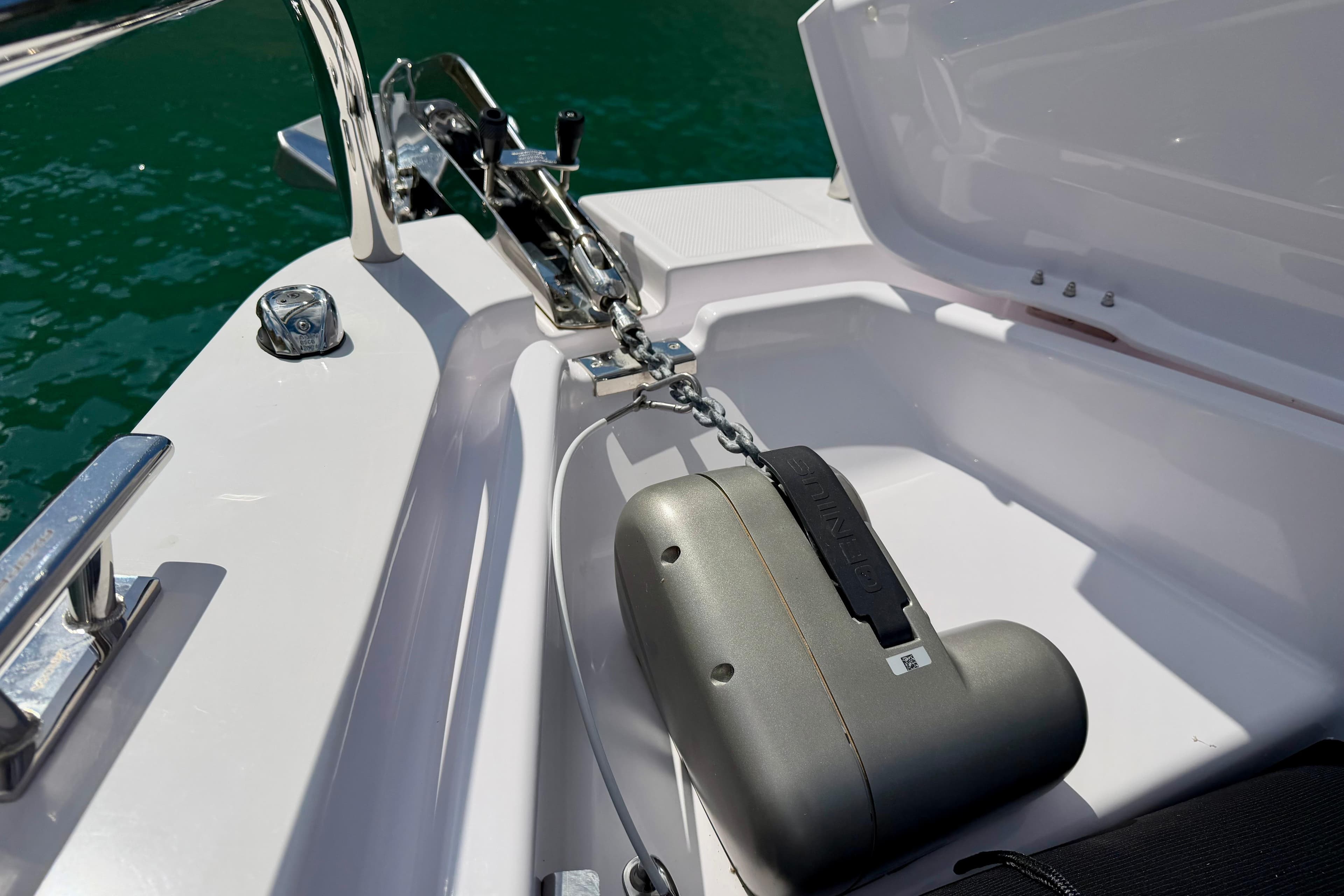 2024 Axopar 37 XC Cross Cabin anchor compartment with chain and winch detail.