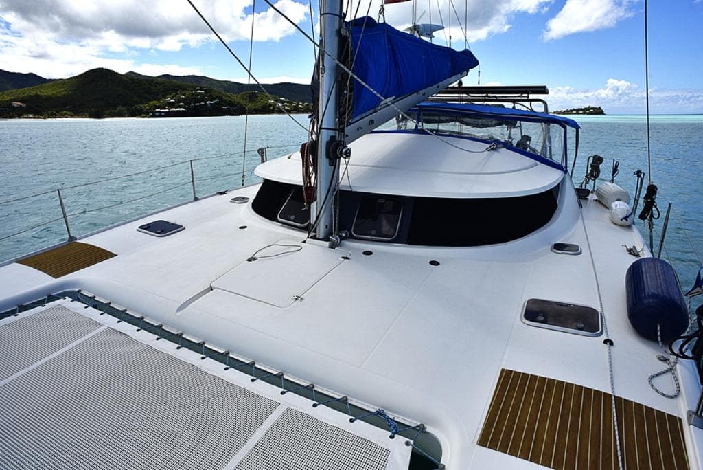 Fountaine Pajot Athena 38 catamaran sailing on calm waters, 1997 model.