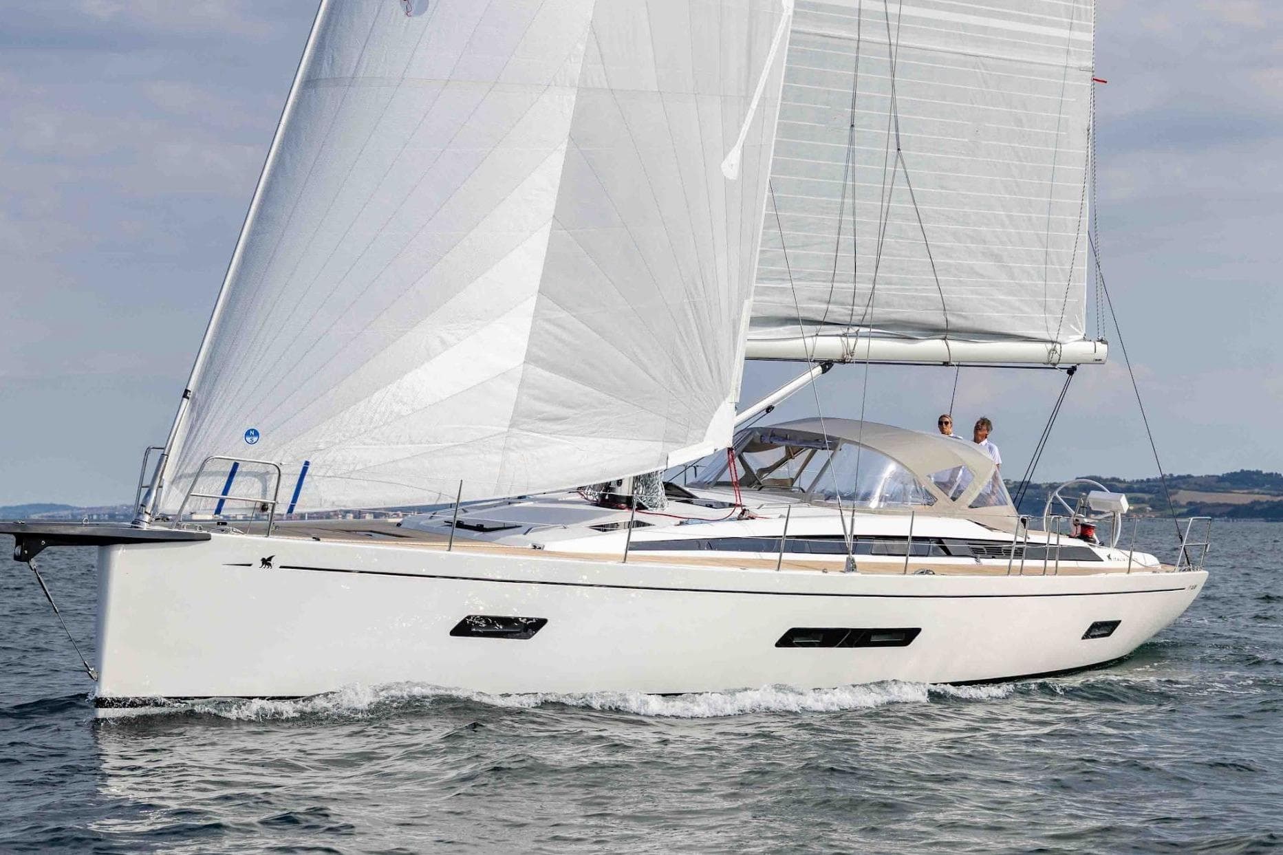 2026 Italia Yachts IY 16.98 sailing on open water, showcasing sleek design and performance.