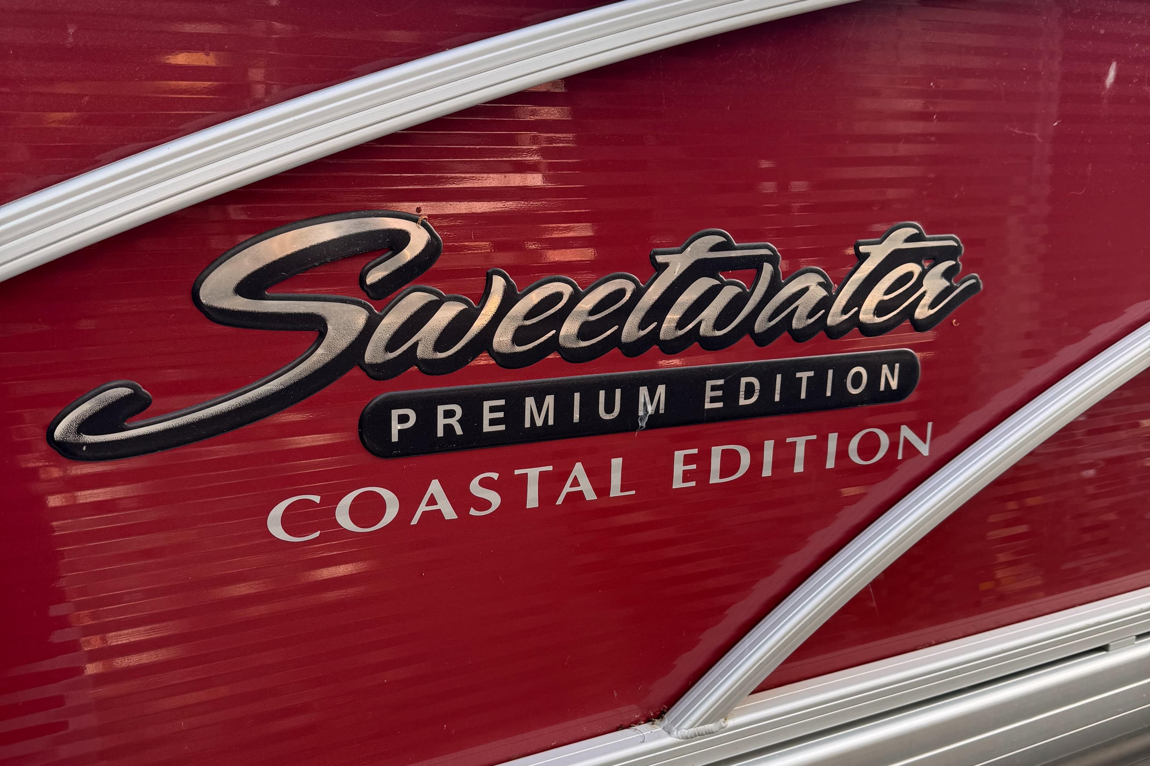 Sweetwater Premium Edition 200, 2015, Coastal Edition logo on red background.