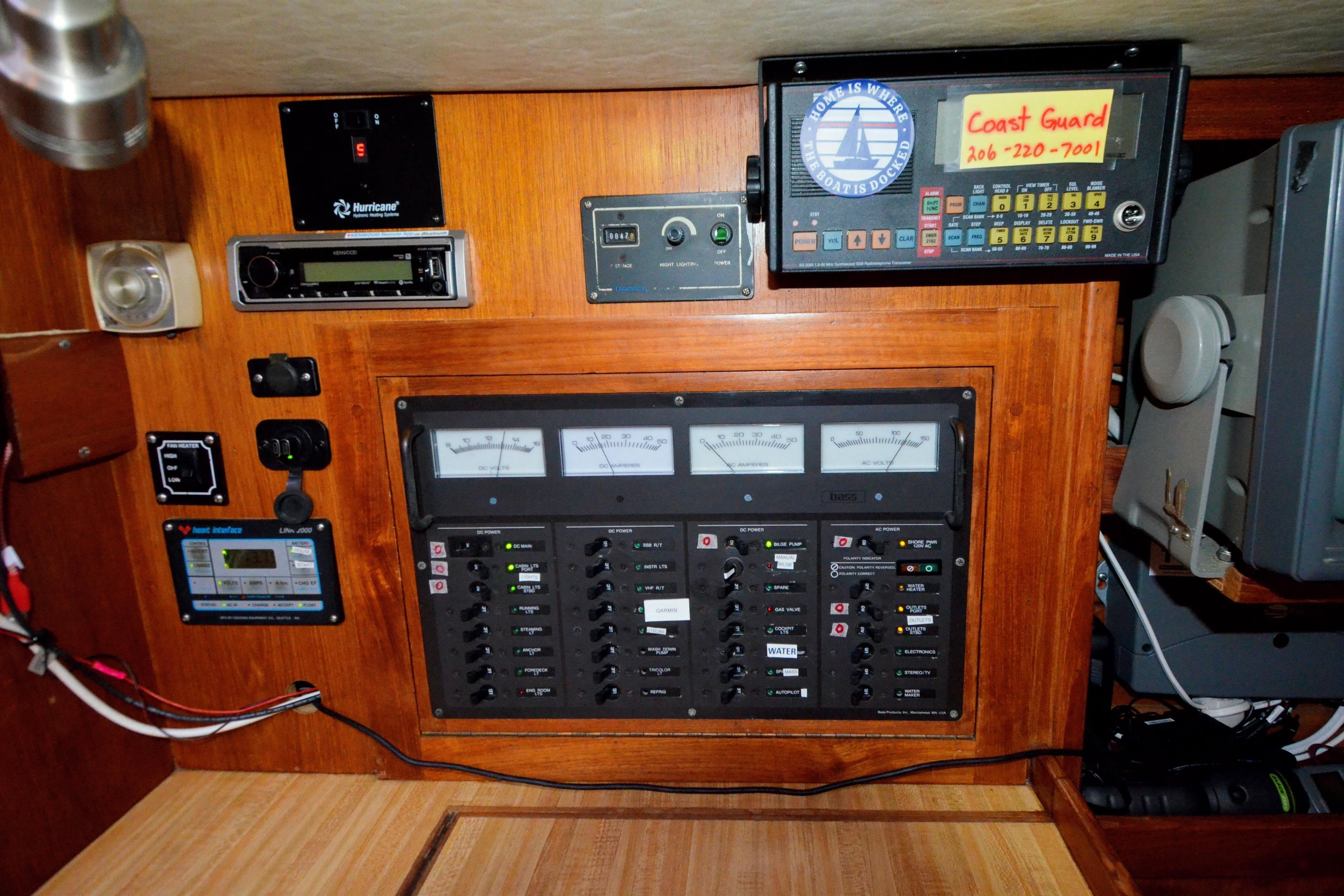 Control panel of a 1983 Nordic 44 sailboat with various gauges and switches.