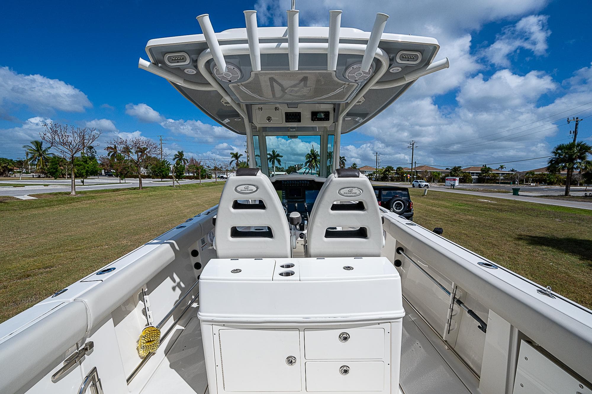 2022 Sailfish 272CC boat interior with dual seats and storage compartments.