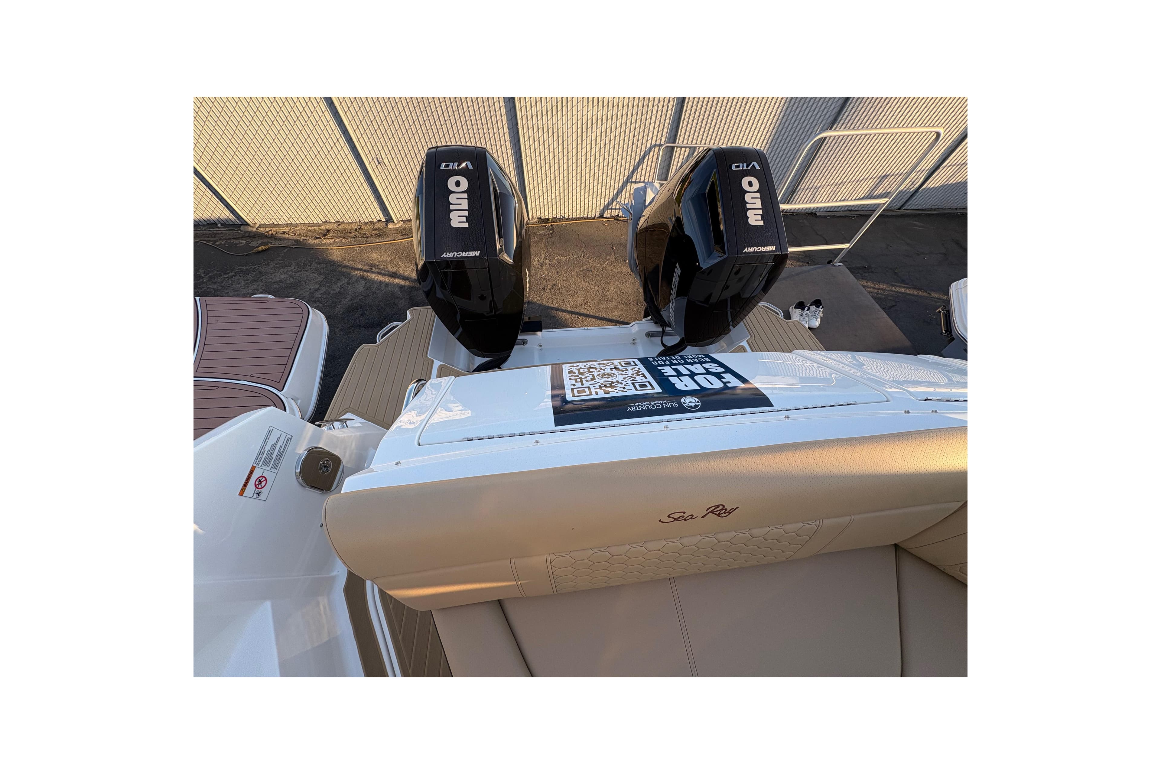 2026 Sea Ray Sundancer 320 Outboard with dual Mercury engines, rear view.