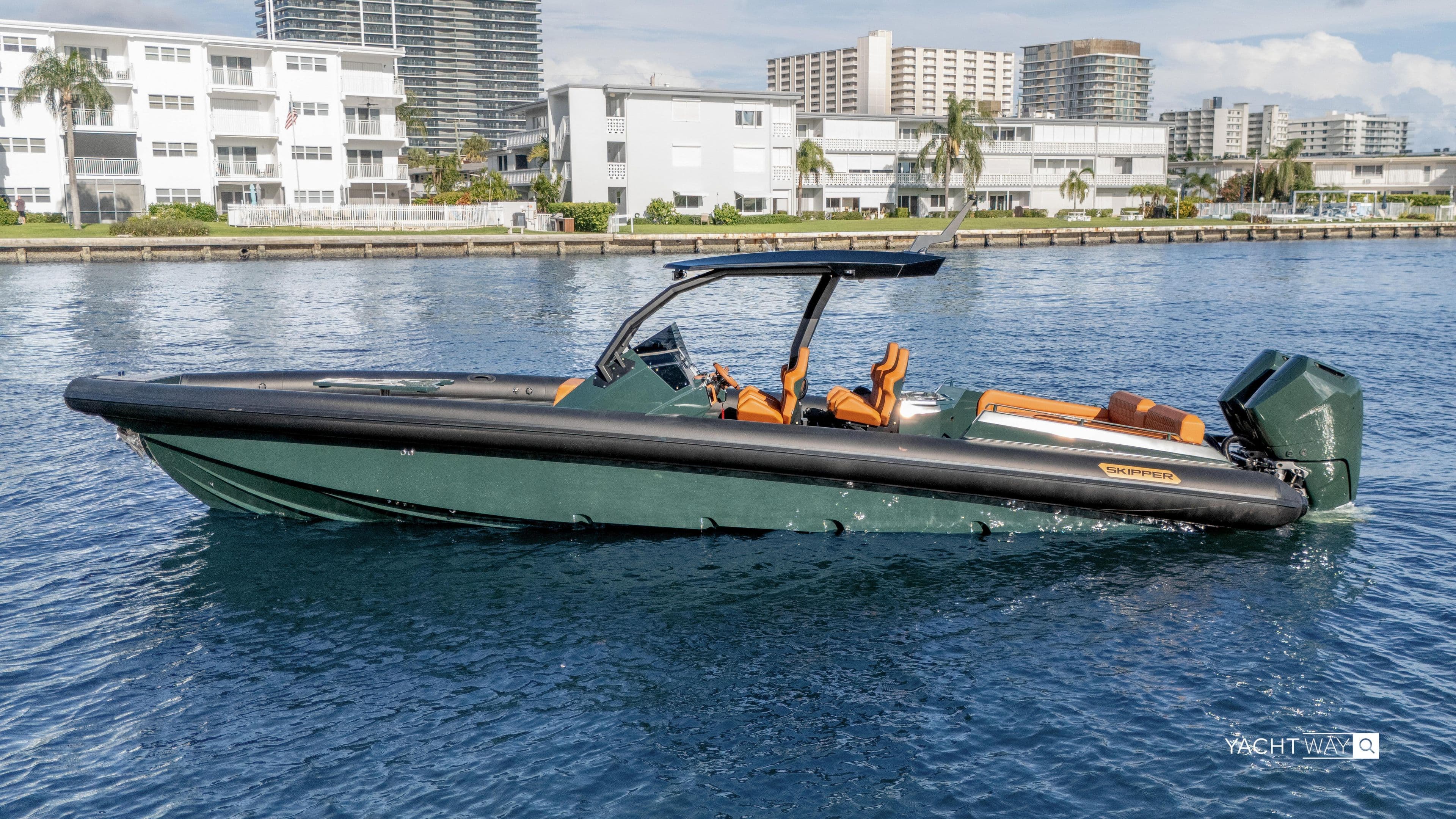 2025 Skipper-BSK 38 boat on water, modern design, cityscape background.