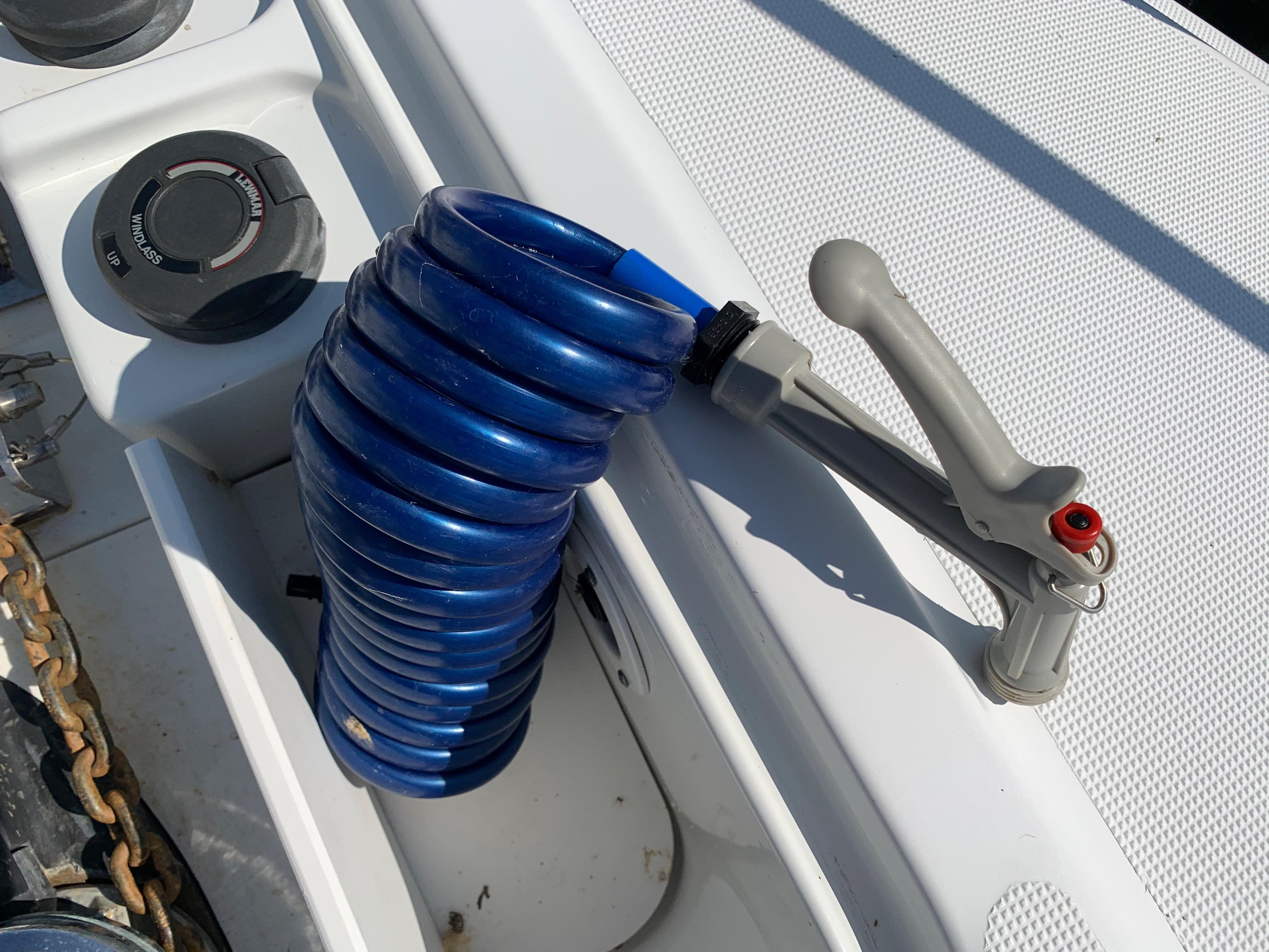 Coiled blue hose on 2005 Formula 34 Performance Cruiser deck.